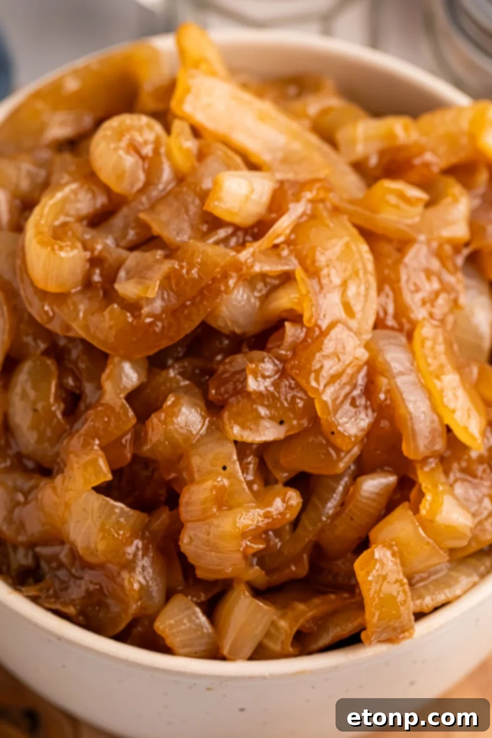 CrockPot Caramelized Onions in a bowl sitting on a table