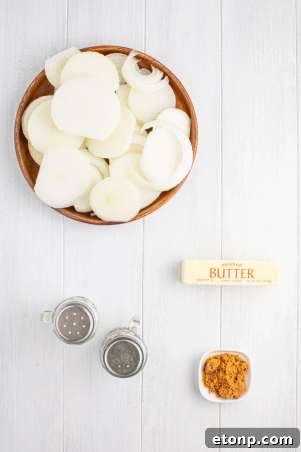 ingredients for CrockPot Caramelized Onions on table in single serve containers