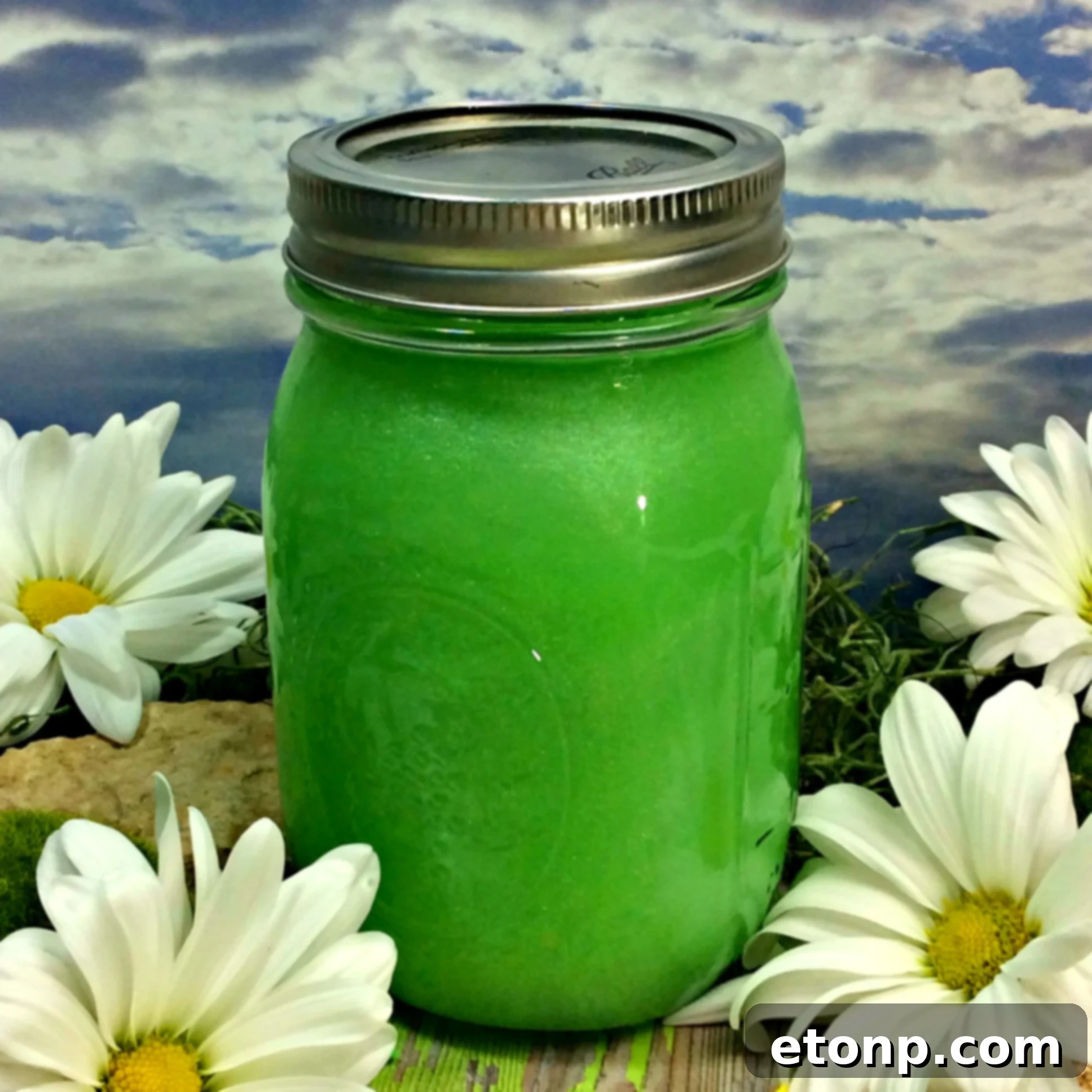 Close-up of sparkling green Fairy Moonshine in a glass