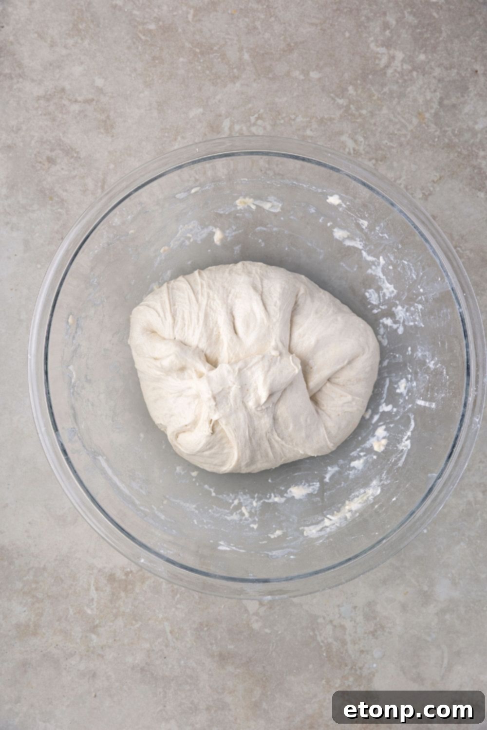 small dough ball for Homemade Sourdough Bread in a bowl on table