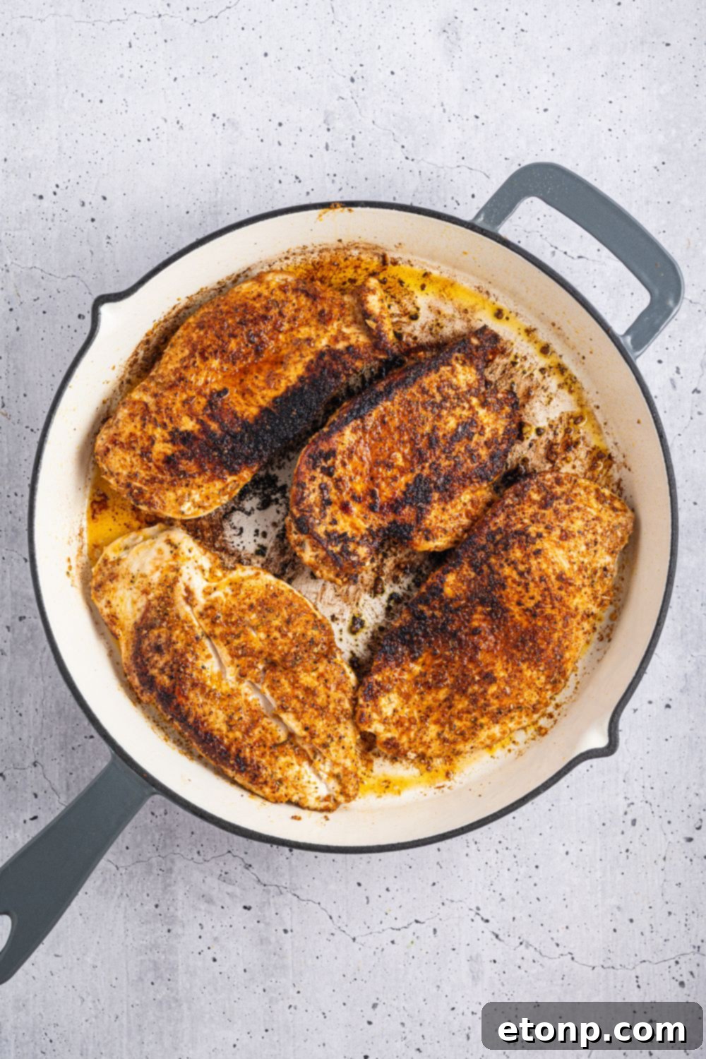 One Pan Cheesy Salsa Chicken 8 cooked chicken in a skillet for Cheesy Salsa Chicken