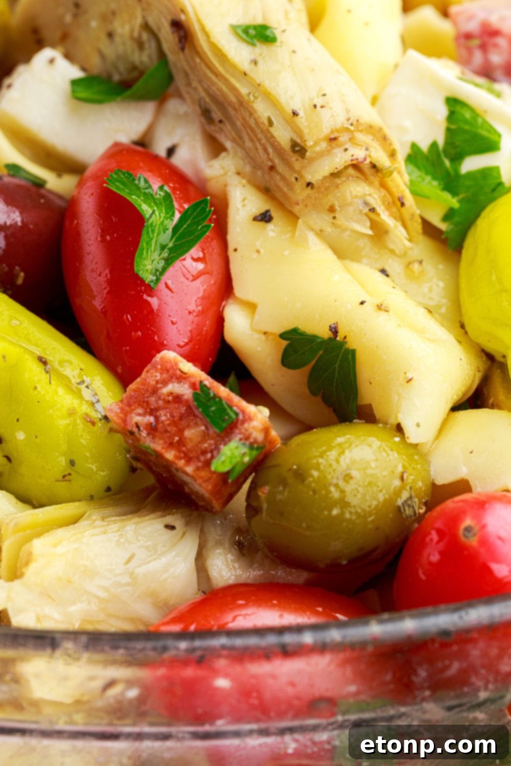 Close-up of the delicious ingredients mixed in Antipasto Tortellini Pasta Salad.