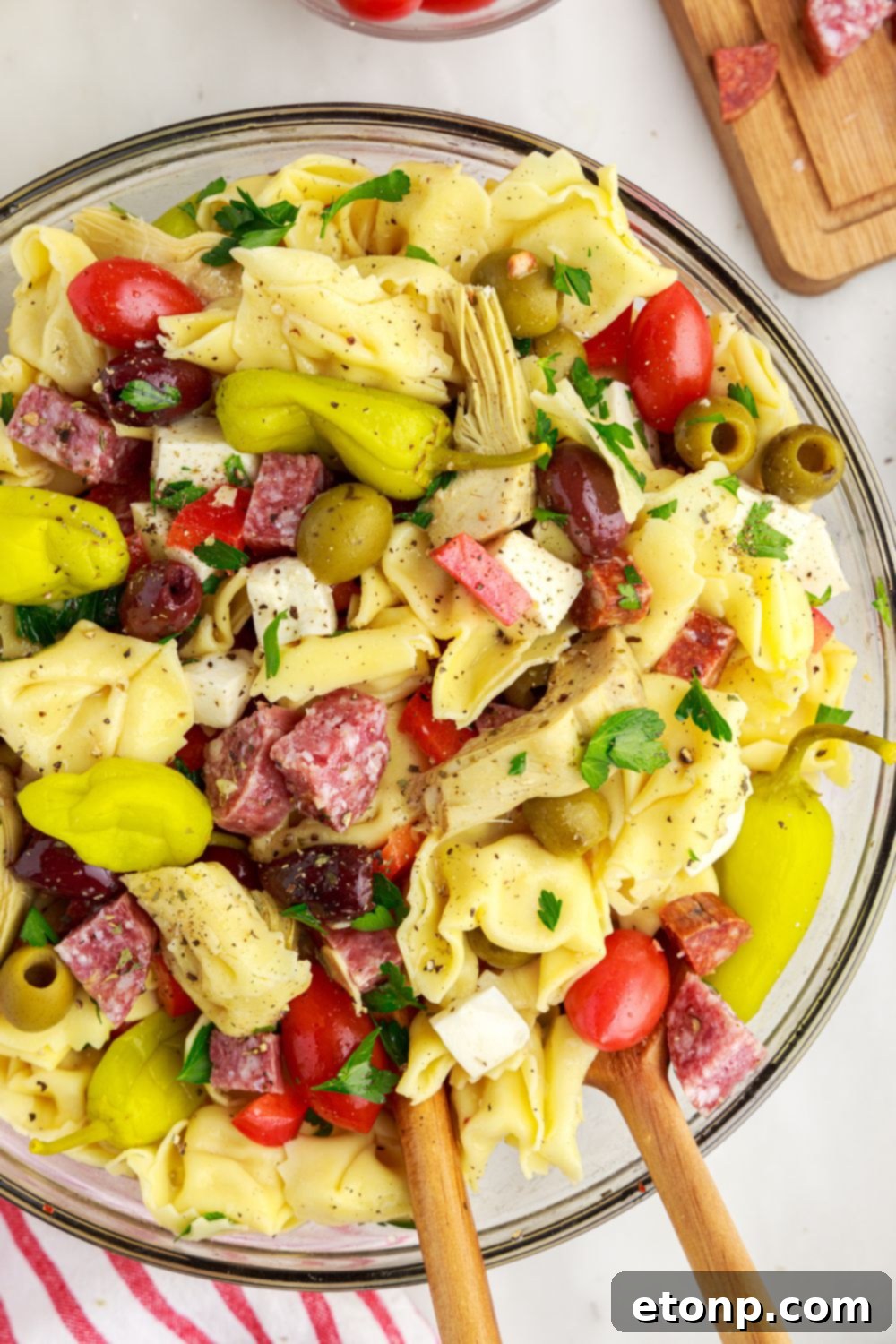 Antipasto Tortellini Pasta Salad in a bowl that is fully mixed and ready to enjoy.