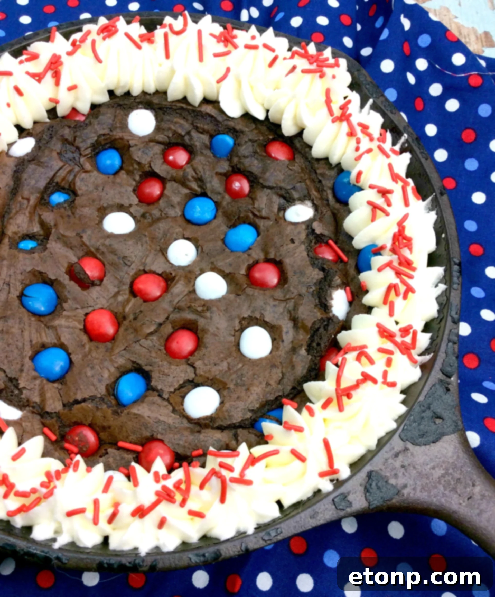Rustic Cast Iron Fudge Brownie 5 Finished Cast Iron Fudge Brownie Skillet with piped frosting and sprinkles