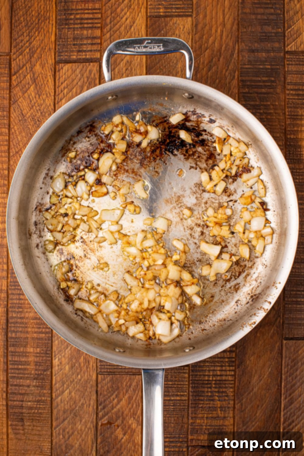 sauted onions in a skillet on the table 