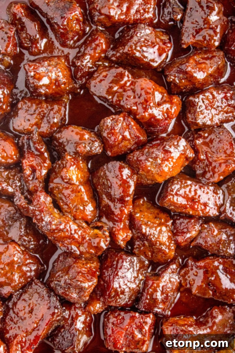 overhead look of Chuck Roast Burnt Ends in a pan on table