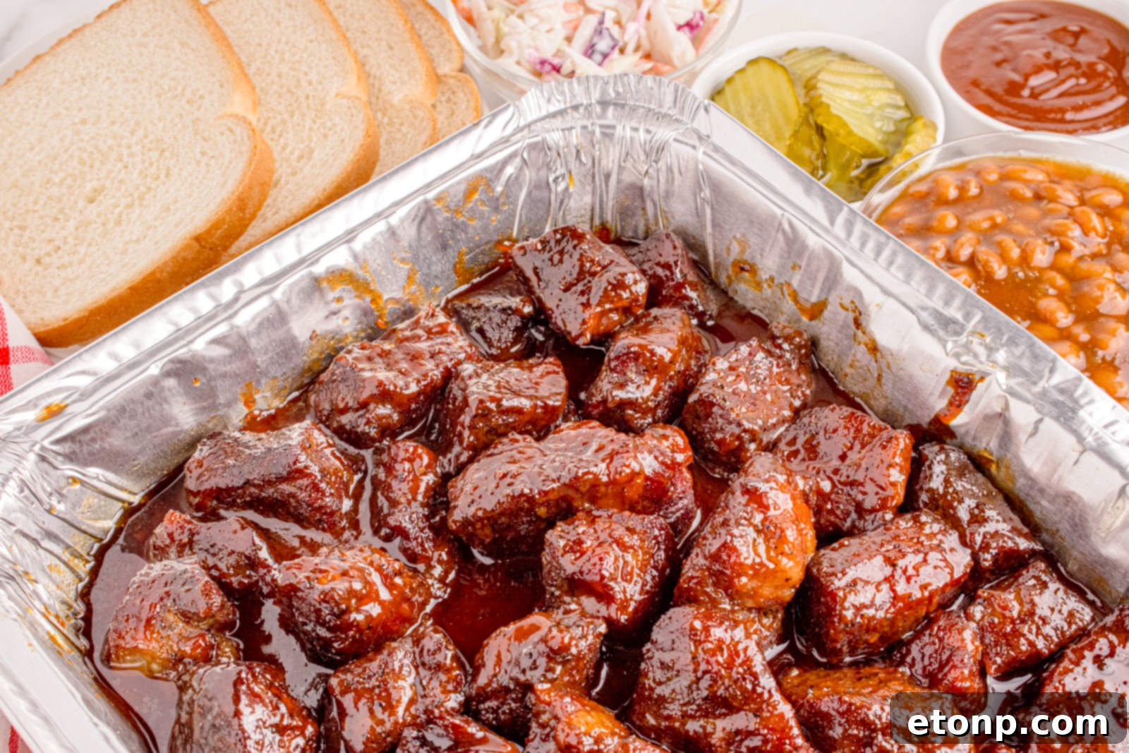 Chuck Roast Burnt Ends piled in a tin pan