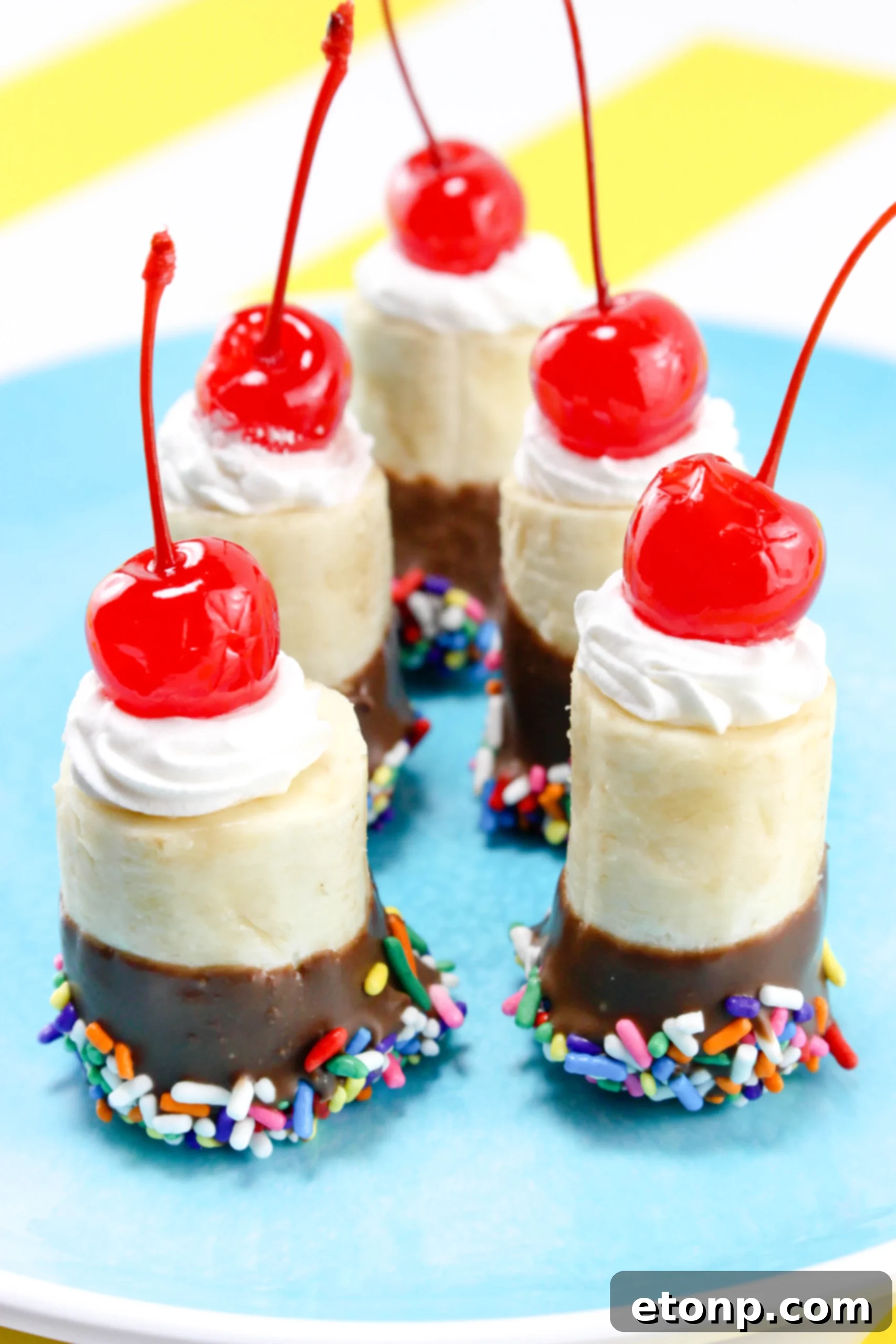 A festive display of banana split bites arranged on a serving tray, perfect for parties and social gatherings.