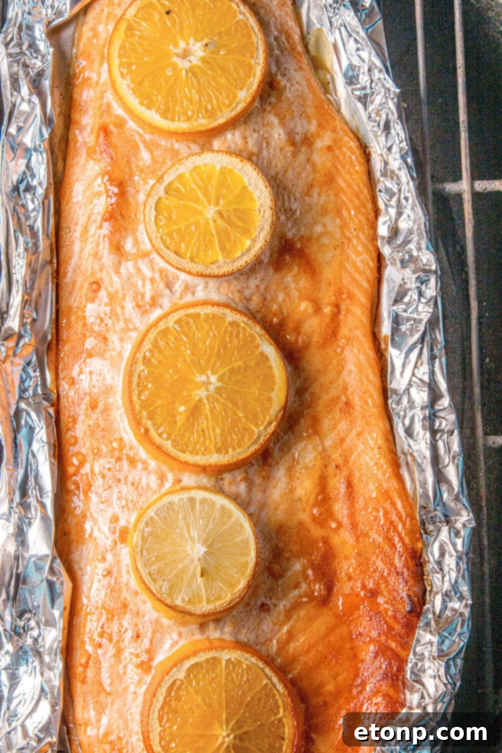 Simple Grilled Honey Mustard Salmon Foil Packets 12 Grilled Honey Mustard Salmon in Foil sitting on a charcoal grill