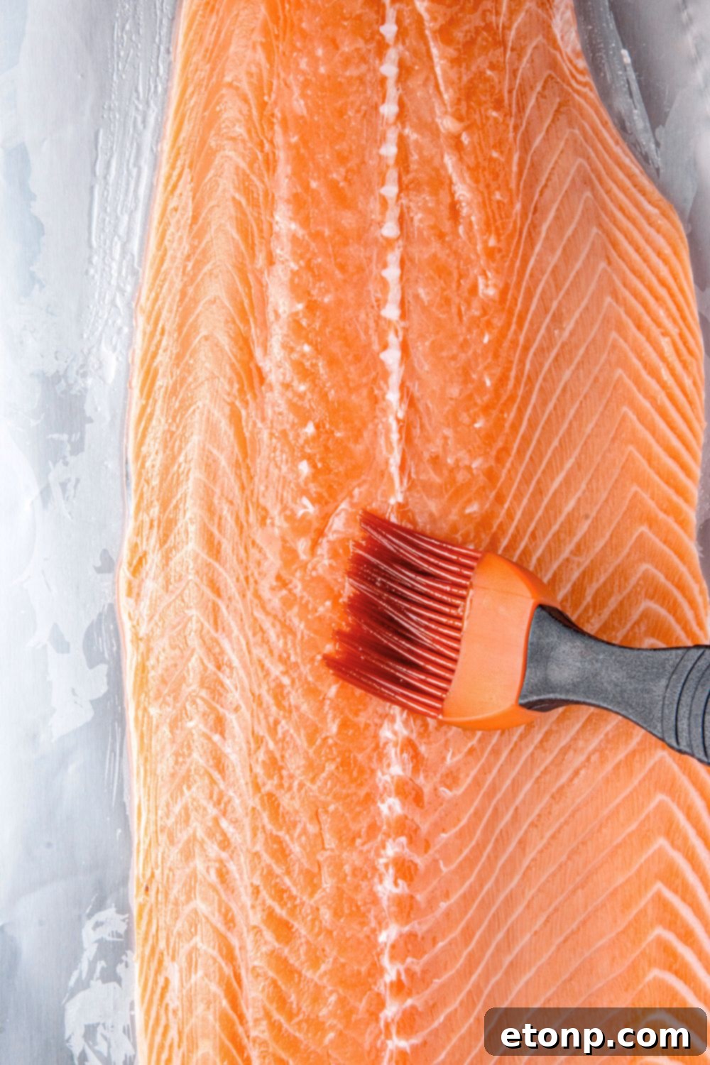 Simple Grilled Honey Mustard Salmon Foil Packets 8 brushing salmon fillet with oil