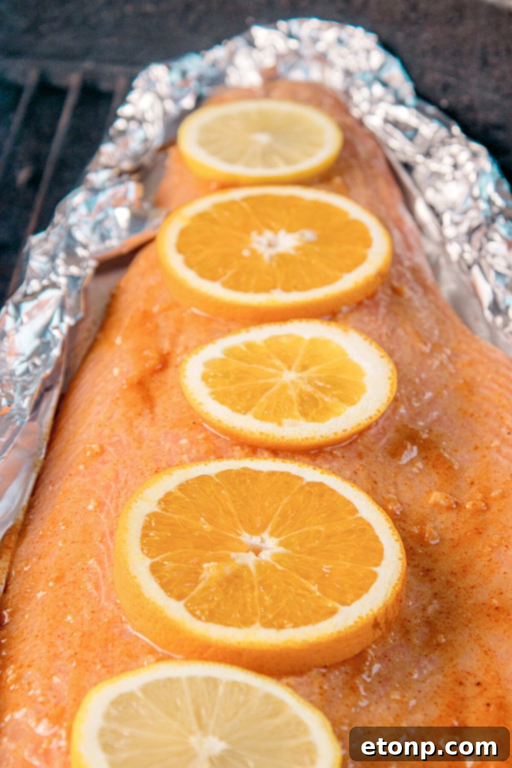 Simple Grilled Honey Mustard Salmon Foil Packets 10 close up of Grilled Honey Mustard Salmon in Foil on the grill