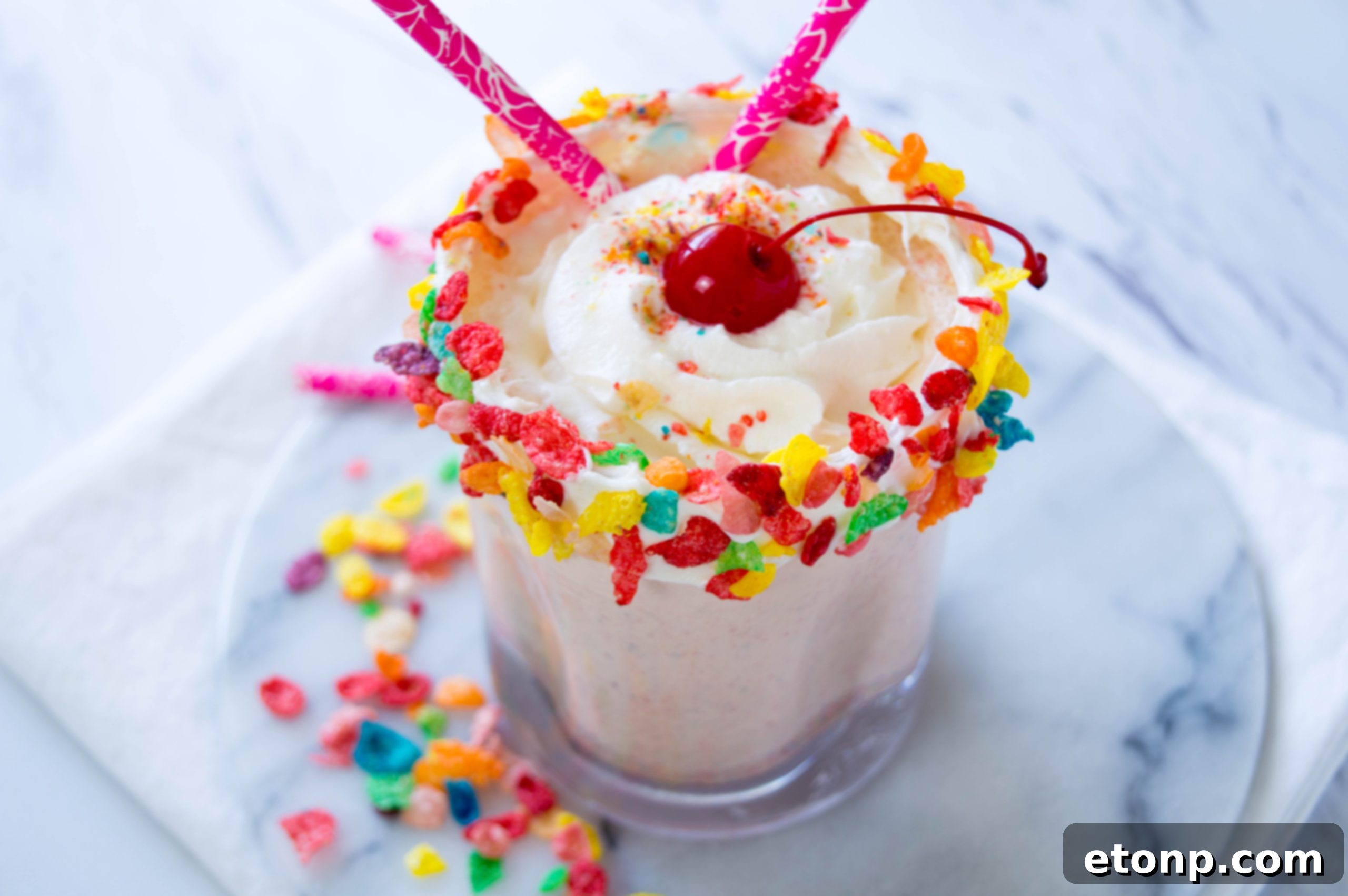 Homemade Fruity Pebbles Milkshake ready to be enjoyed, highlighting its vibrant colors