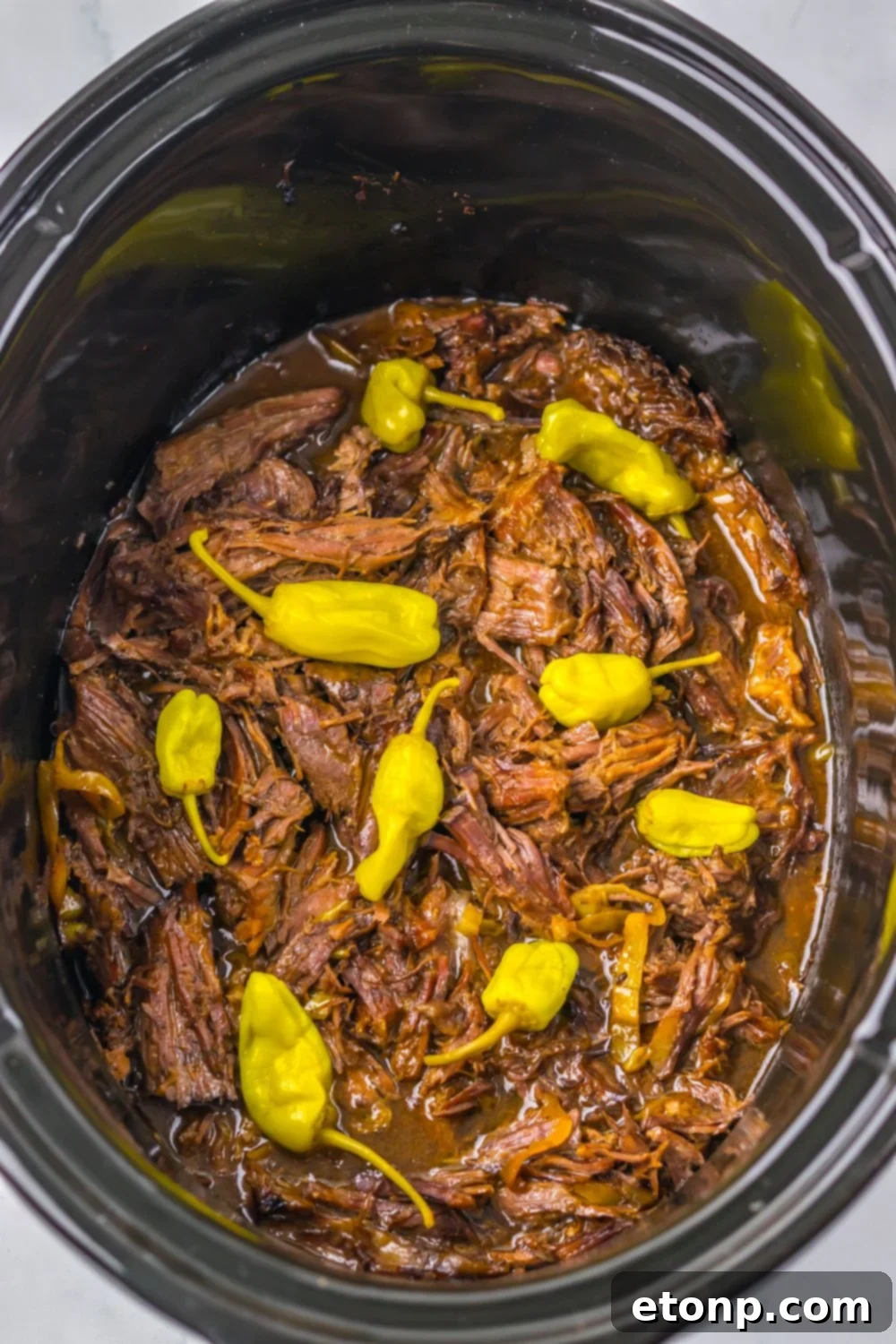 overhead look of Slow Cooker Mississippi Pot Roast in the pan 