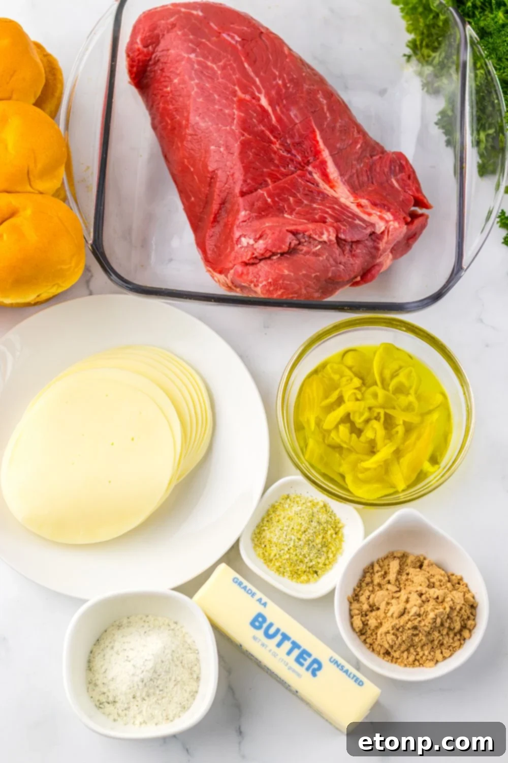 Slow Cooker Mississippi Pot Roast Sliders ingredients all on single serve containers sitting on table 