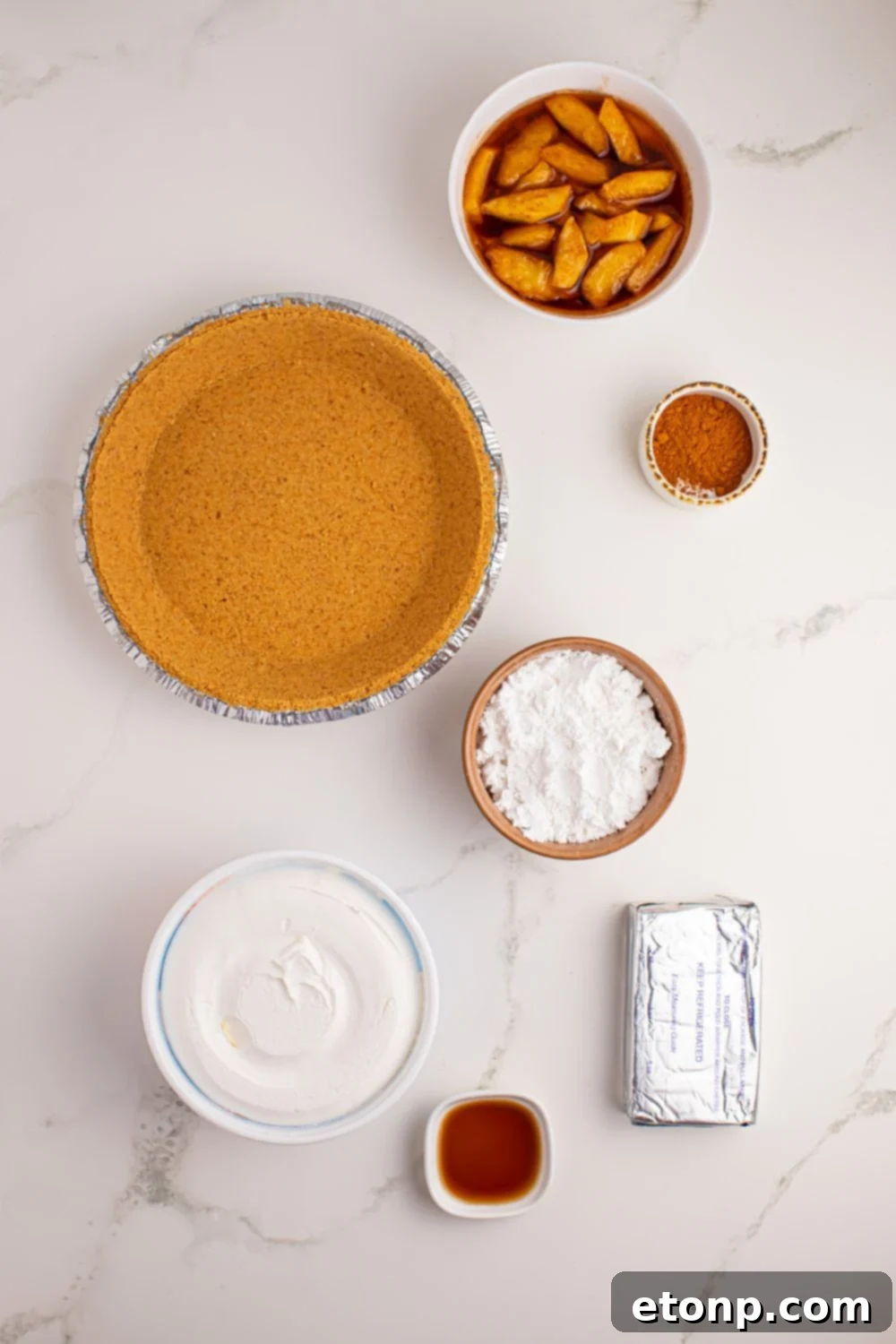 ingredients for No Bake Apple Cheesecake pie in single serve containers on table 