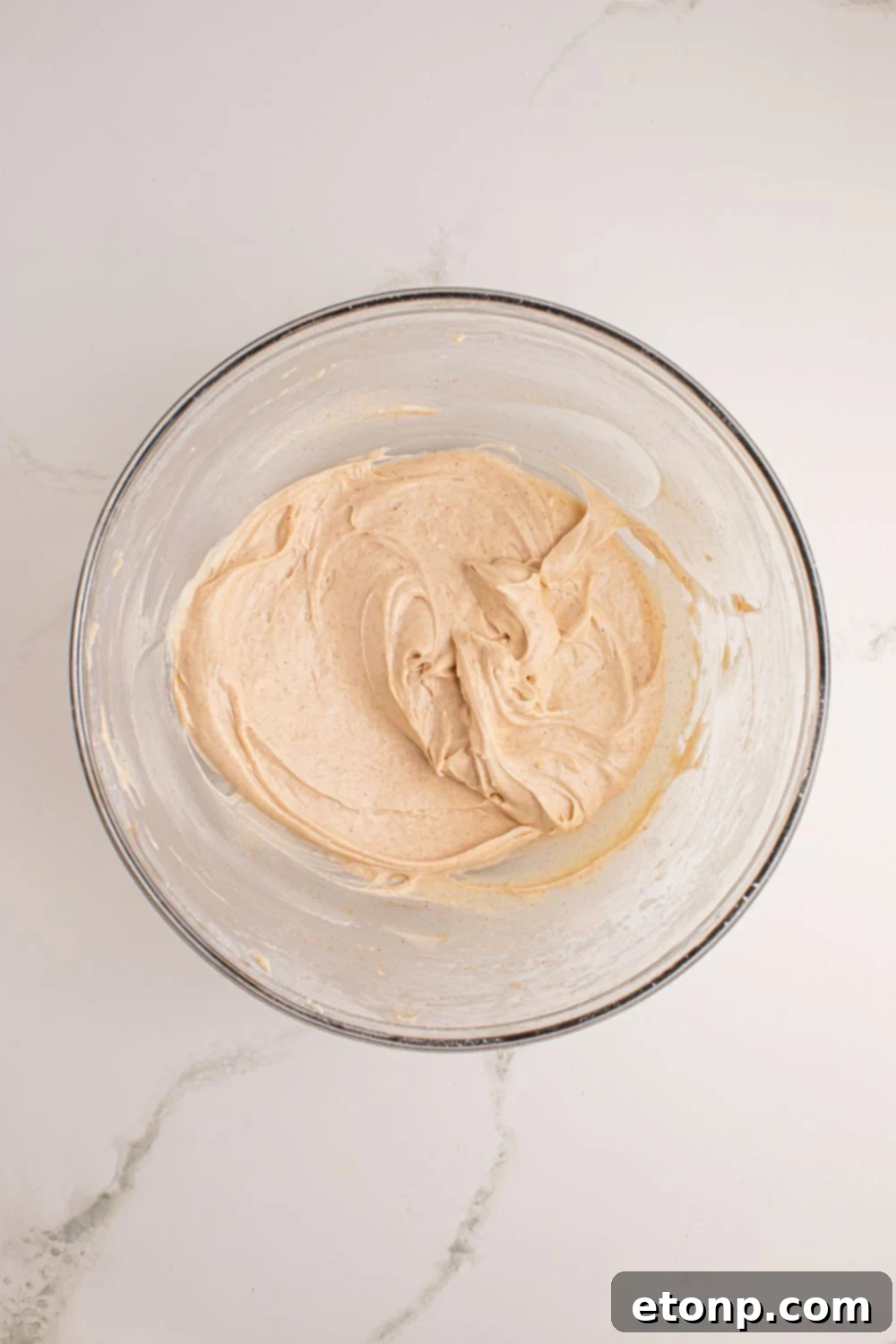 filling for No Bake Apple Cheesecake in a glass bowl
