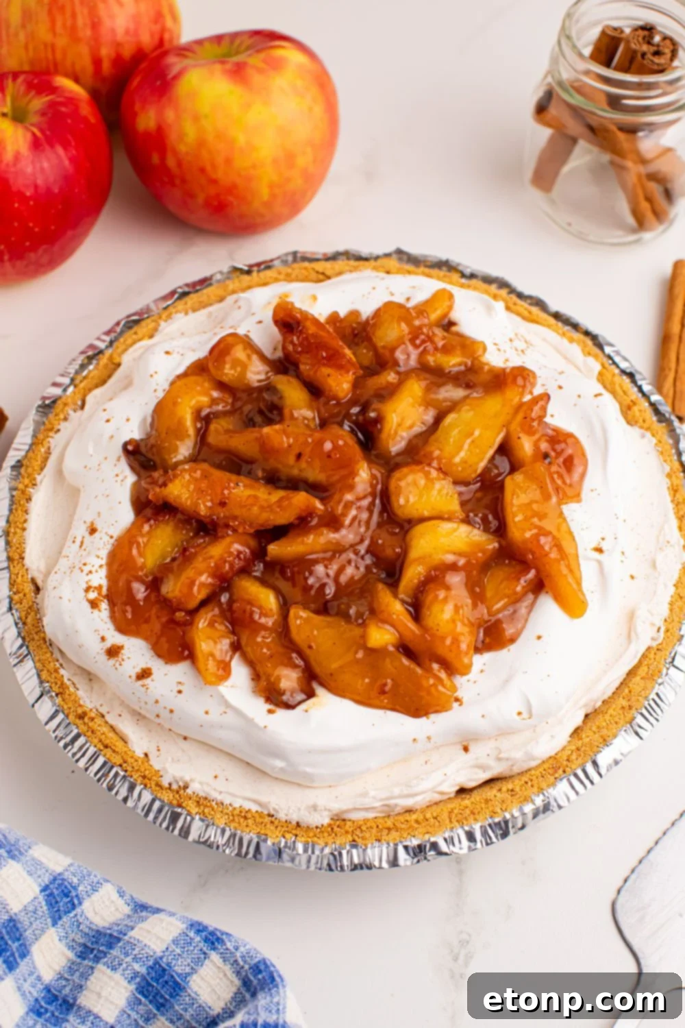 overhead shot of the No Bake Apple Cheesecake pie on a table 