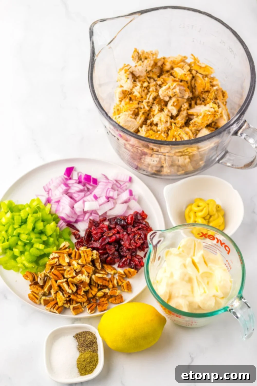 ingredients for making a homemade Thanksgiving Turkey Salad on table in single serve containers 