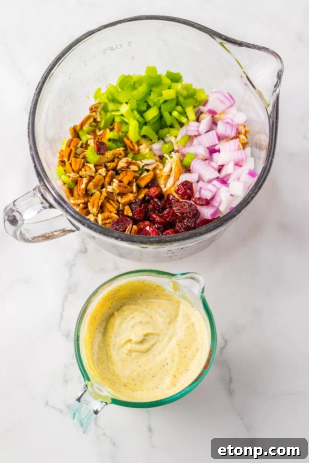 sauce in bowl and other ingredietns in another bowl for making Thanksgiving Turkey Salad