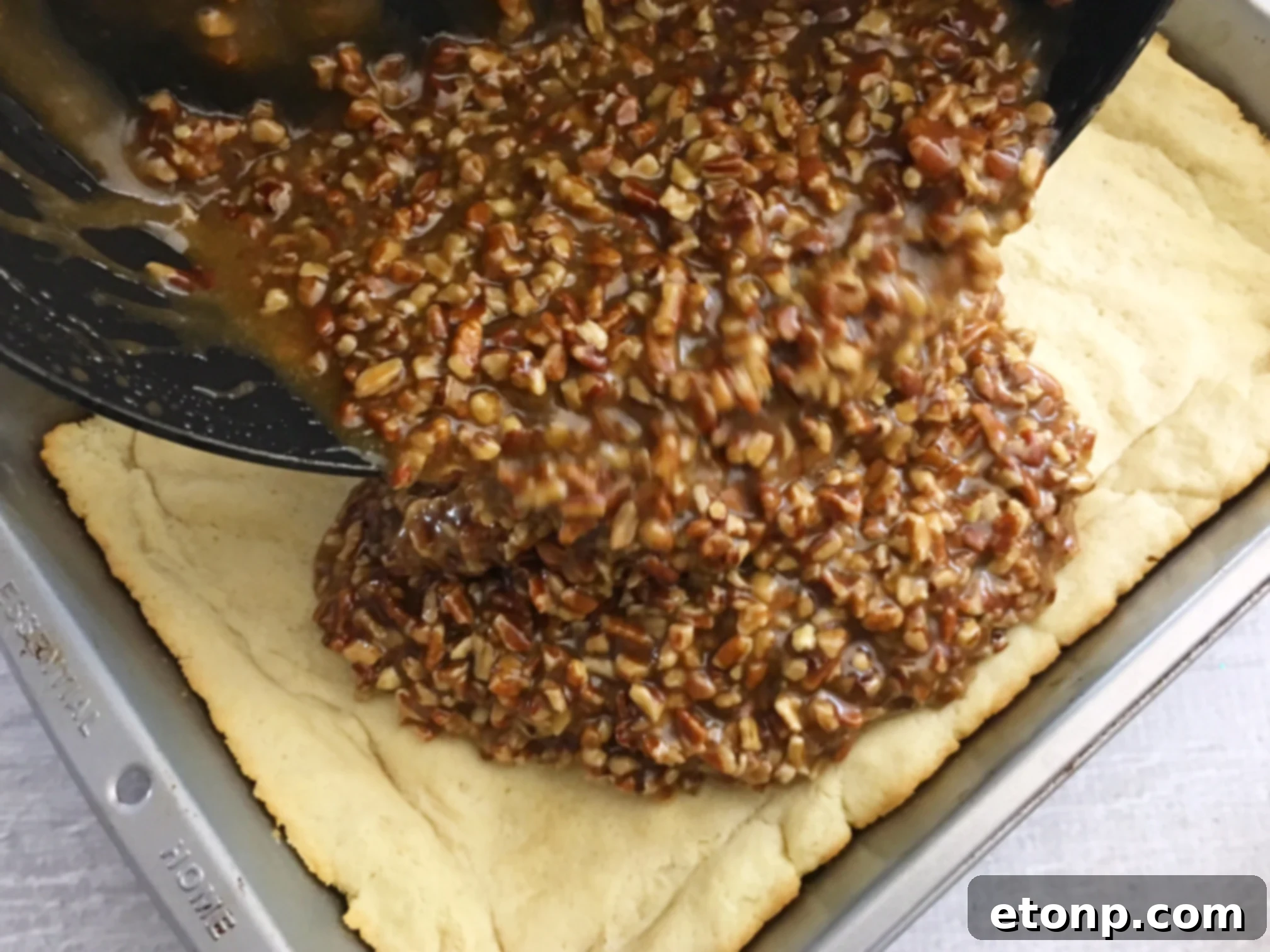 An overhead shot of a full tray of Pecan Pie Bars, just waiting to be cut and served.