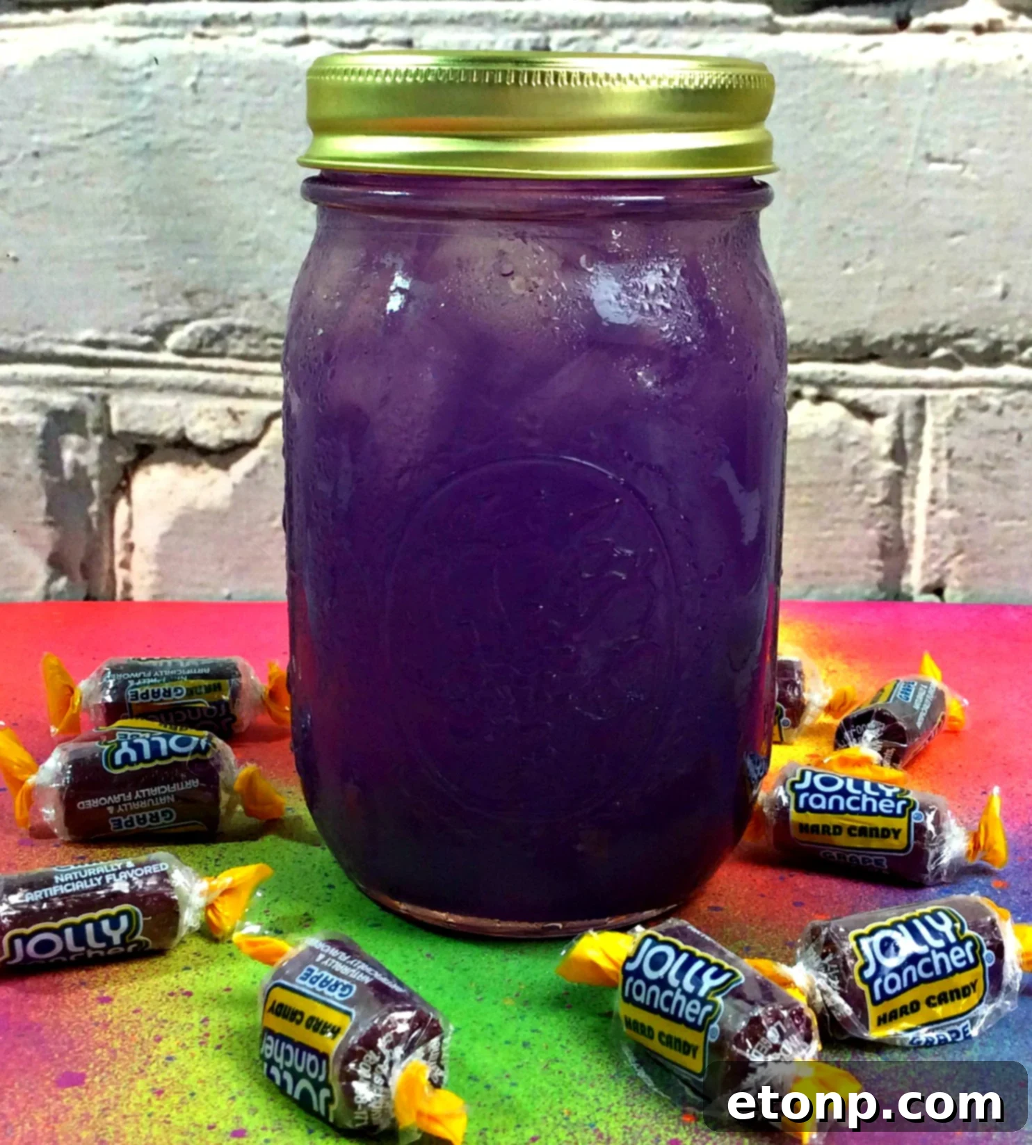 Grape Jolly Rancher Moonshine bottles ready for infusion