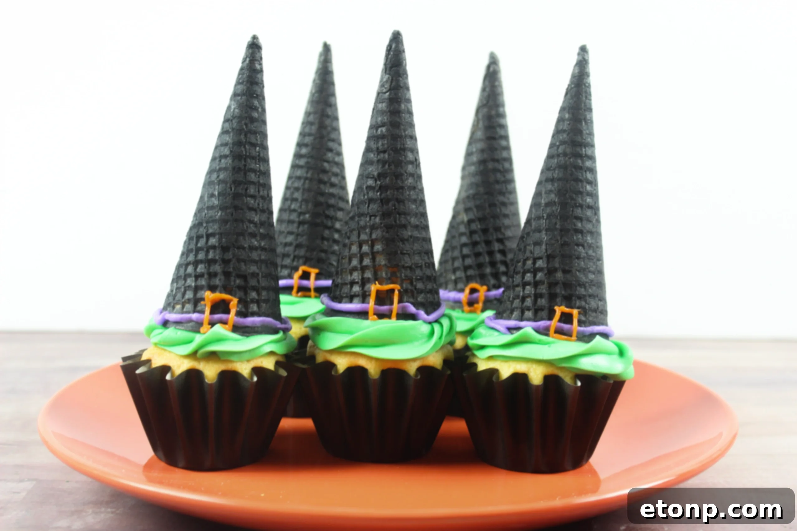 Delightful witch hat cupcakes, perfect for a spooky Halloween celebration