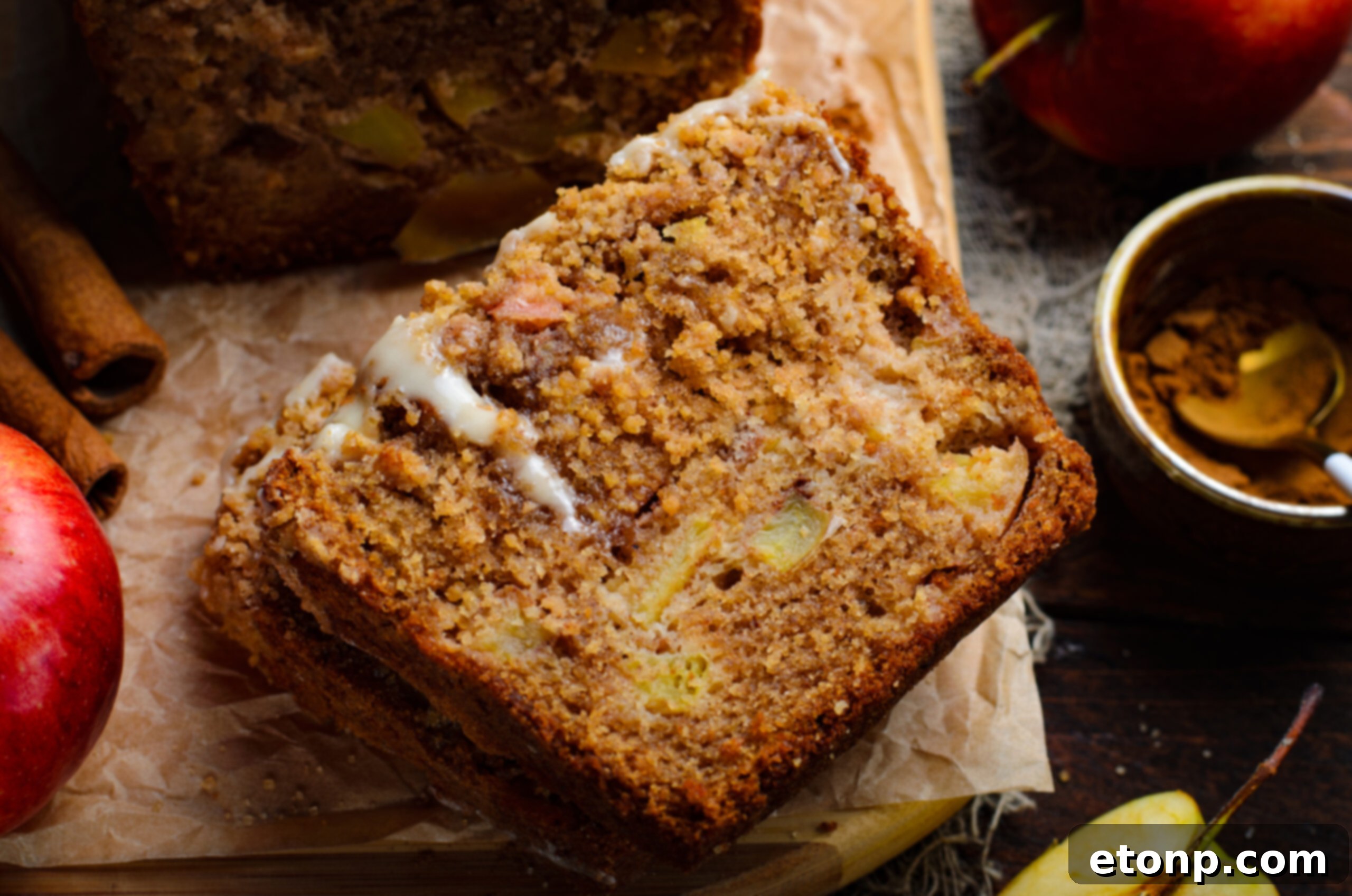 close up view of a slice of the Apple Cinnamon Loaf Cake showing the moist inside