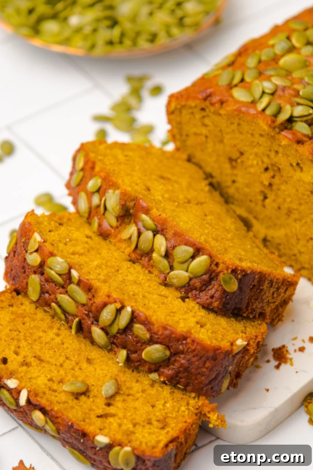 thick slices of Starbucks Pumpkin Bread placed on a white table 