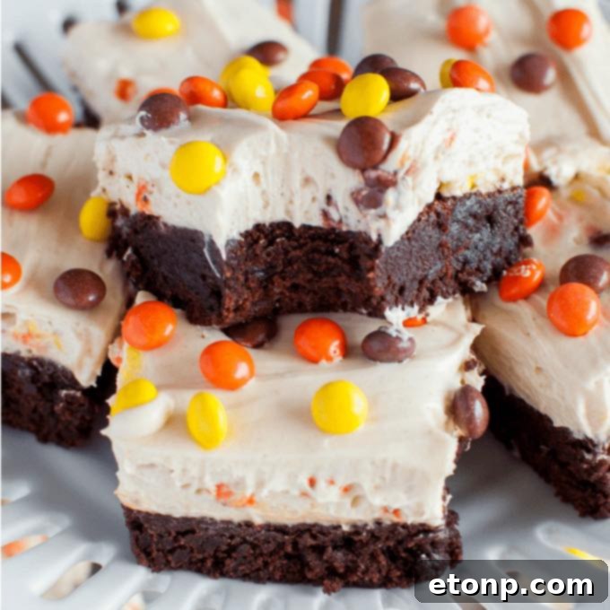 No-Bake Reese's Pieces Peanut Butter Cheesecake Brownies
