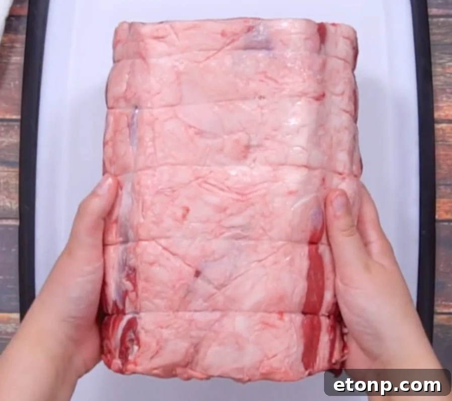 Close-up of prime rib roast with a crispy garlic crust