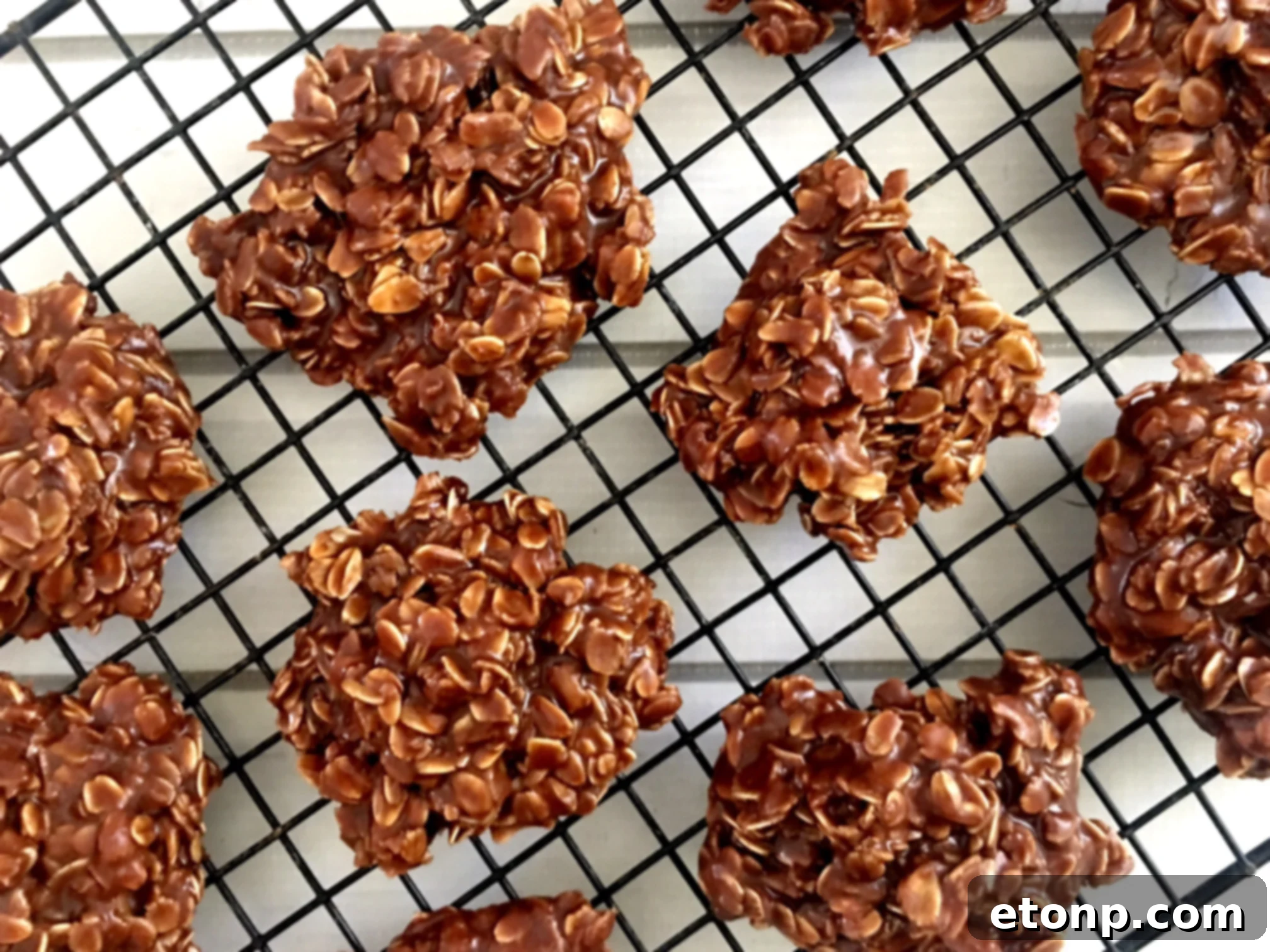 Easy Chocolate Peanut Butter No Bake Cookies 6 Close-up of freshly made chocolate peanut butter no-bake cookies, showing their appealing texture.