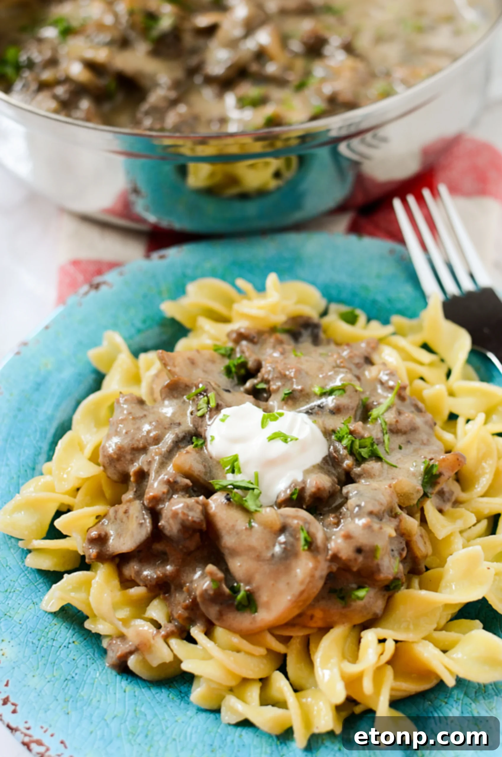 Ground beef stroganoff in a skillet, showcasing the one-pan cooking method.
