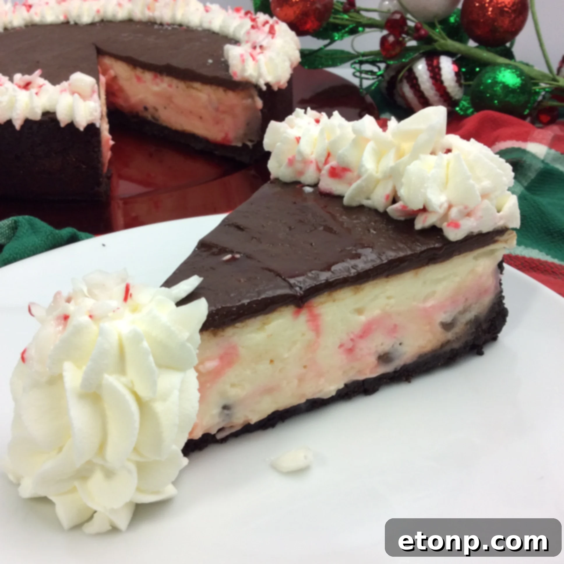 Delicious White Chocolate Candy Cane Cheesecake slices