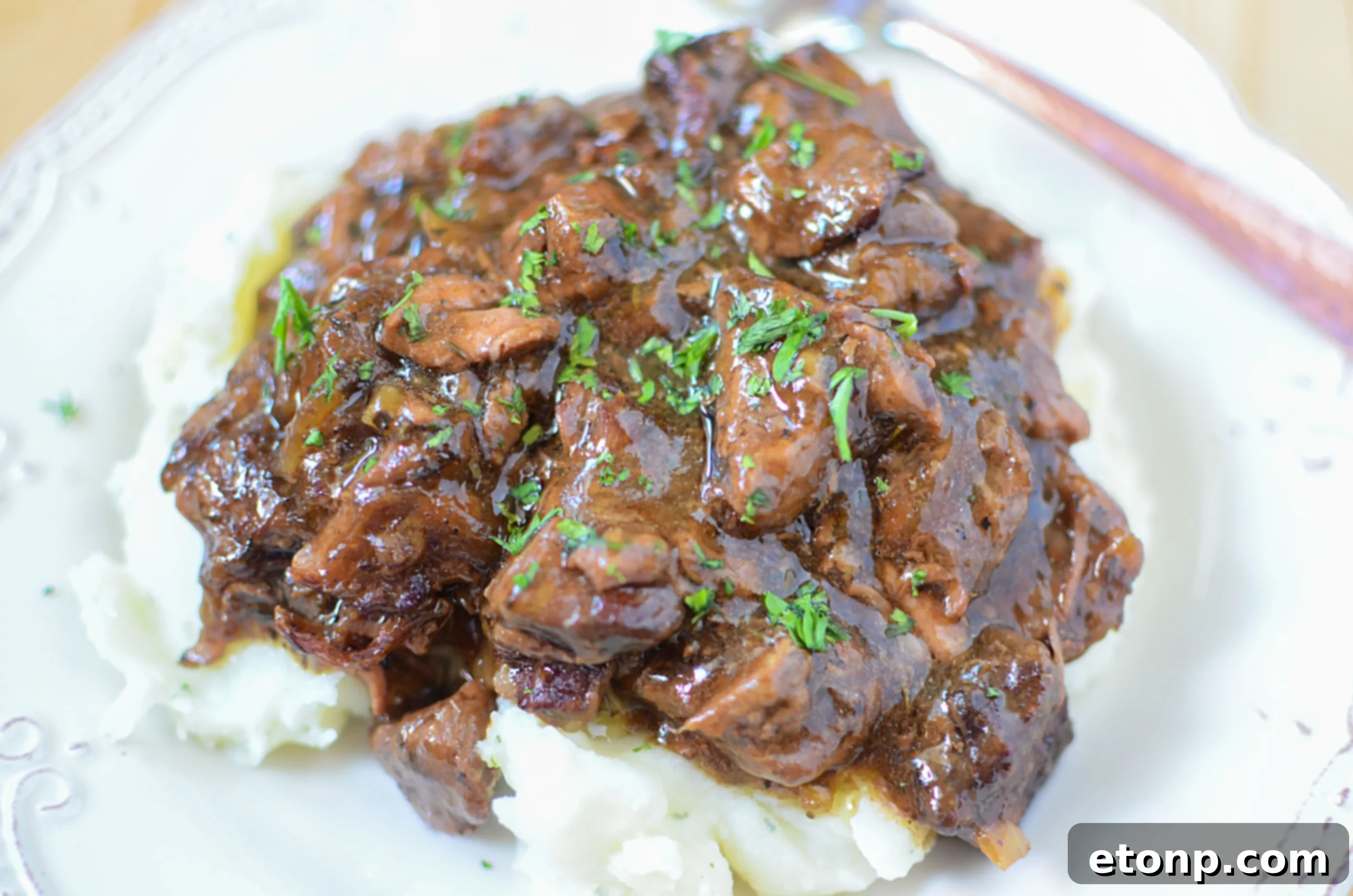 Delicious slow cooker sirloin beef tips with mushroom gravy ready to serve