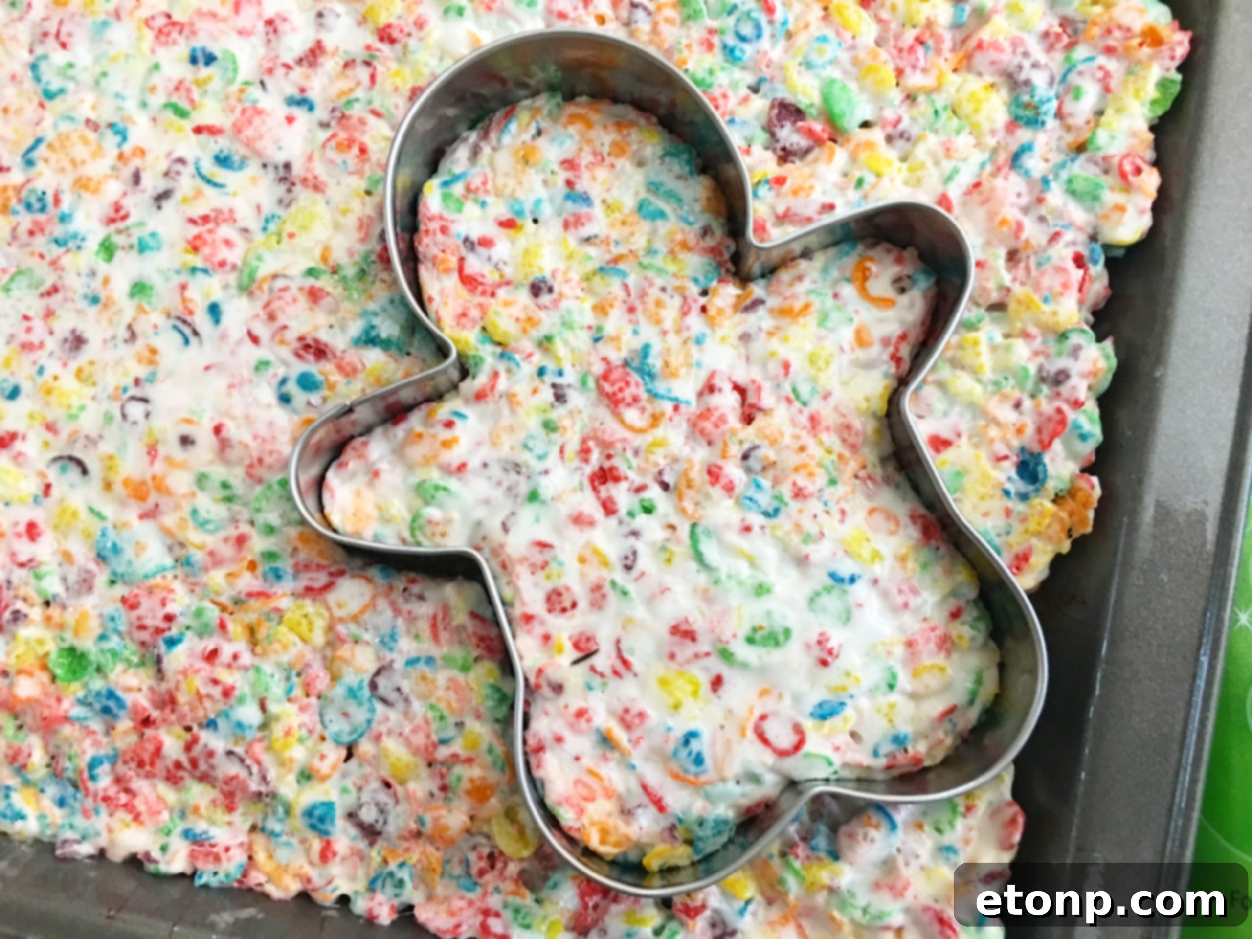Kids enjoying making and decorating Fruity Pebbles Krispy Treats