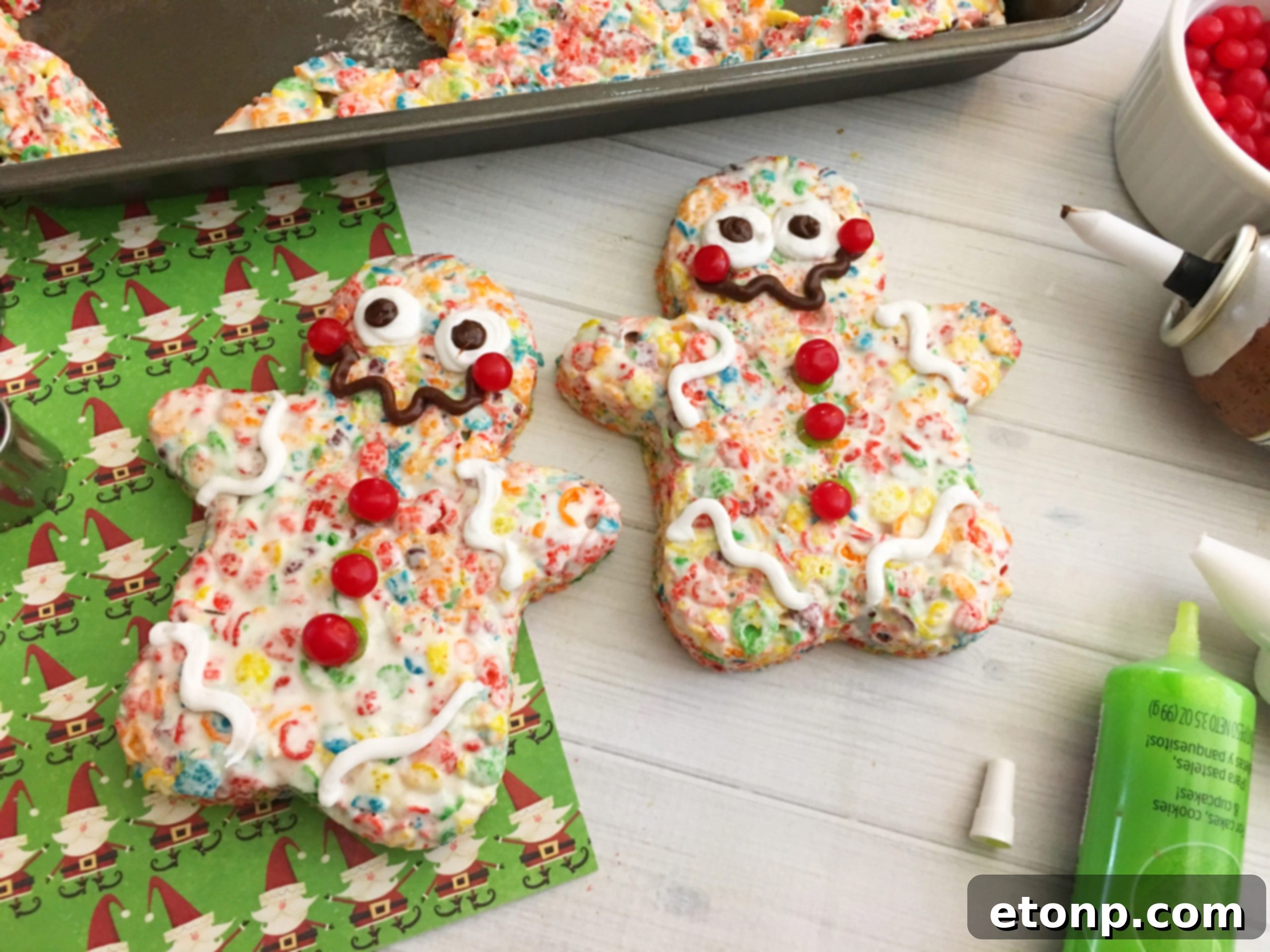 Beautifully decorated Gingerbread Krispy Treats with Fruity Pebbles