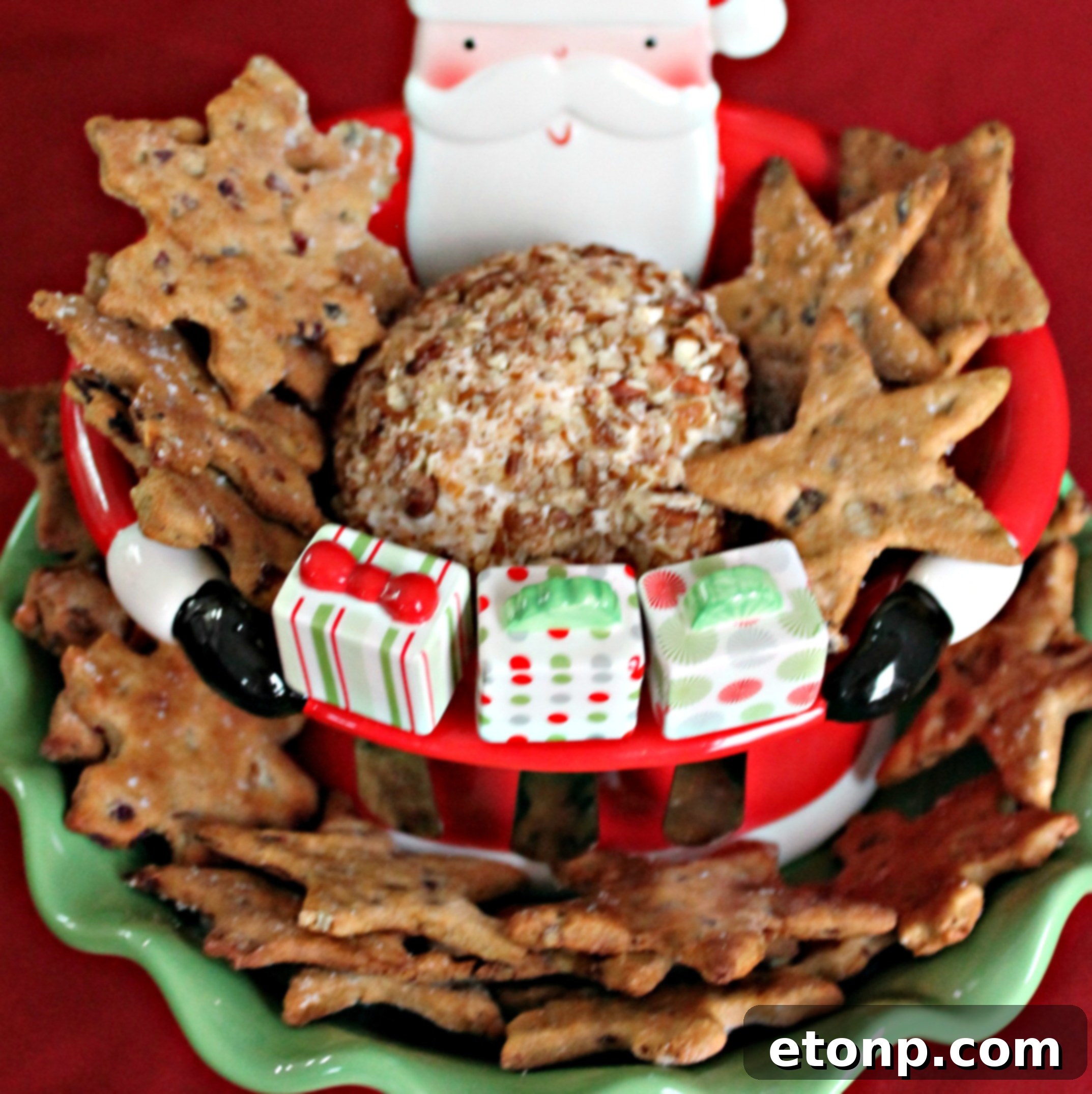 Bacon Cheddar Ranch Pecan Ball beautifully presented on a platter with crackers