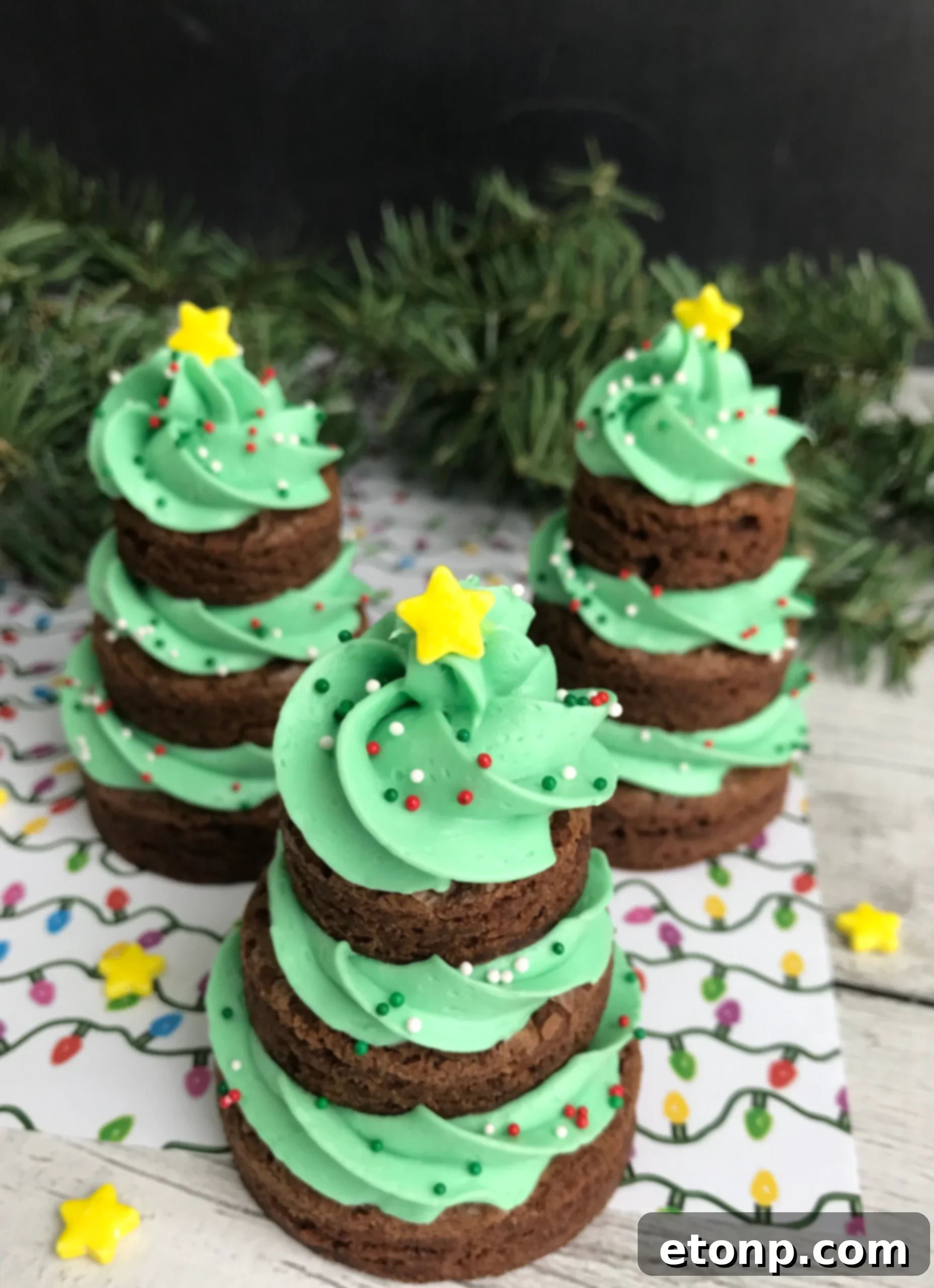 Christmas Tree Brownie Treats 5 Decorated brownie Christmas tree topped with a yellow star and colorful sprinkles