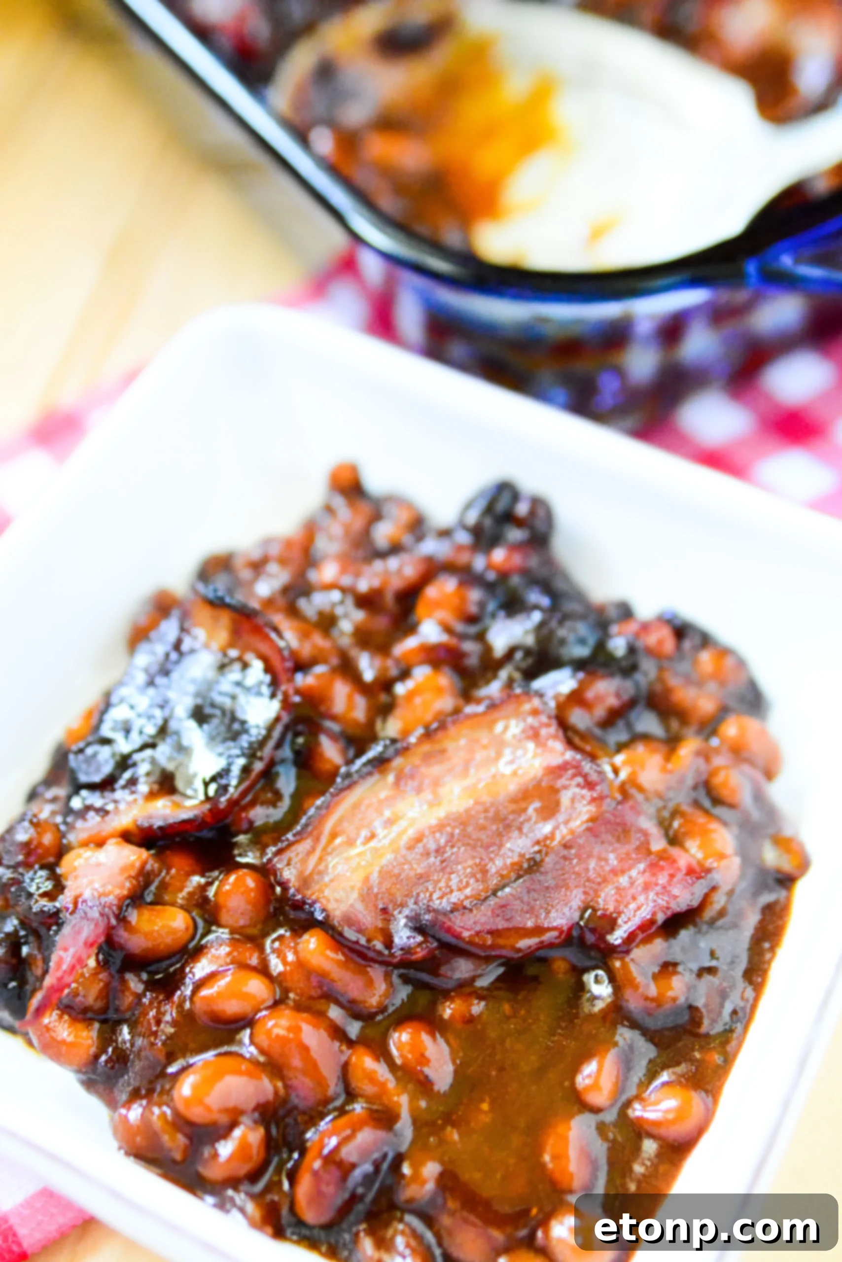 Ultimate Brown Sugar Bacon Baked Beans 8 A close-up of the delicious baked beans, showing the individual beans and the rich sauce