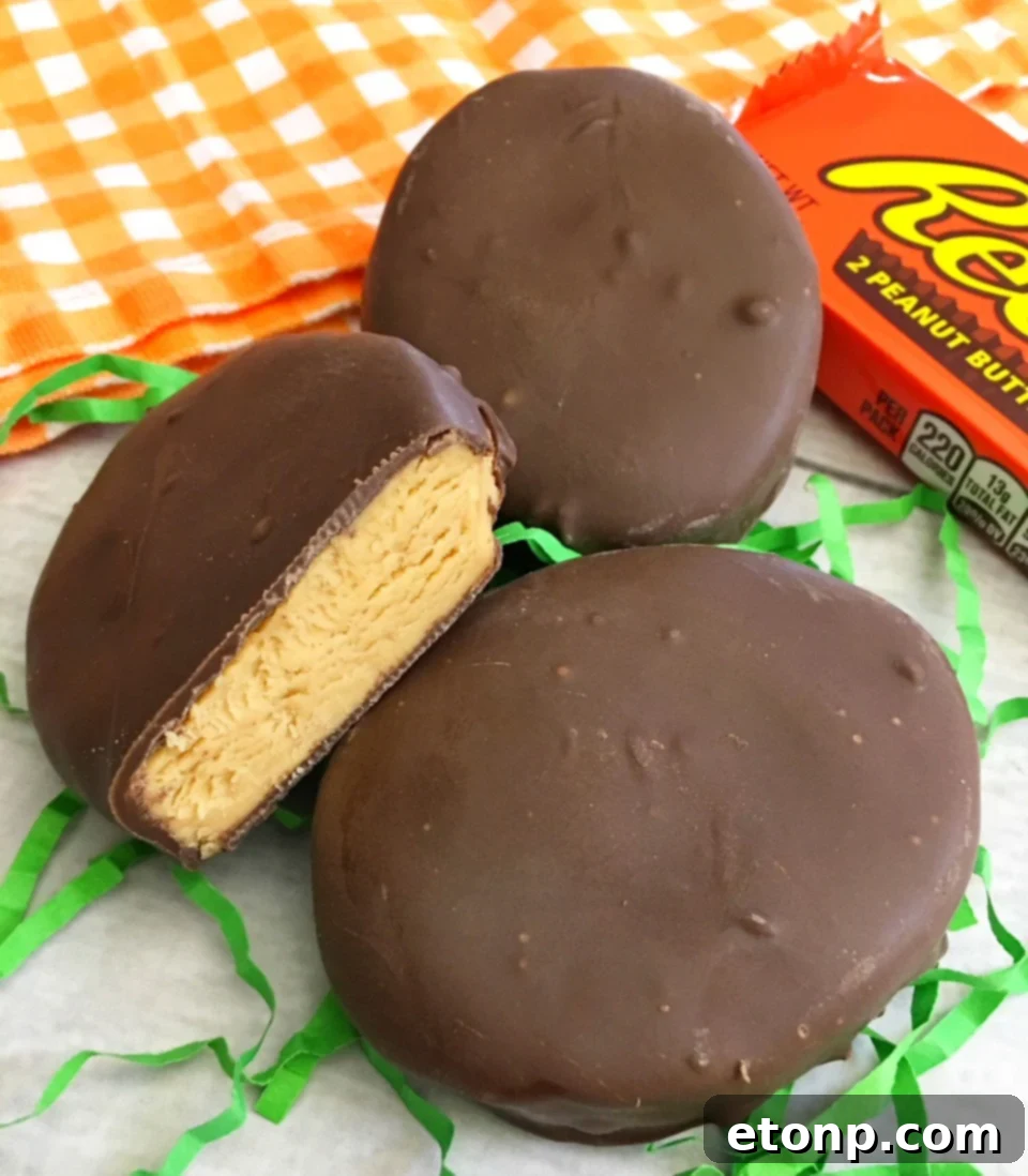 Homemade No-Bake Reese's Peanut Butter Eggs 2 Delicious homemade Reese's peanut butter eggs on a pink plate