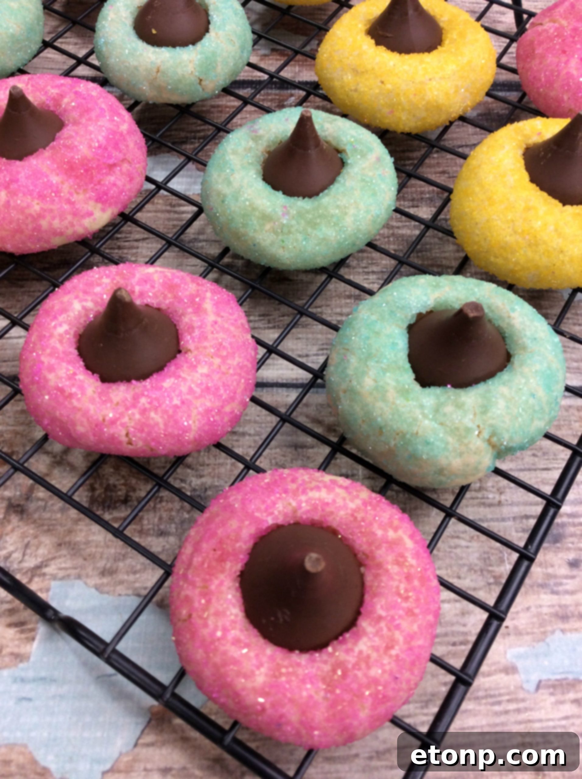 Close-up of a single Springtime Thumbprint Cookie showcasing its perfect round shape and colorful sprinkles