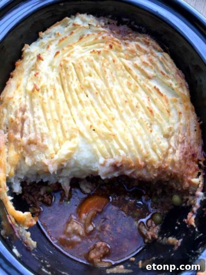 Traditional Slow Cooker Shepherd's Pie with a golden mashed potato topping