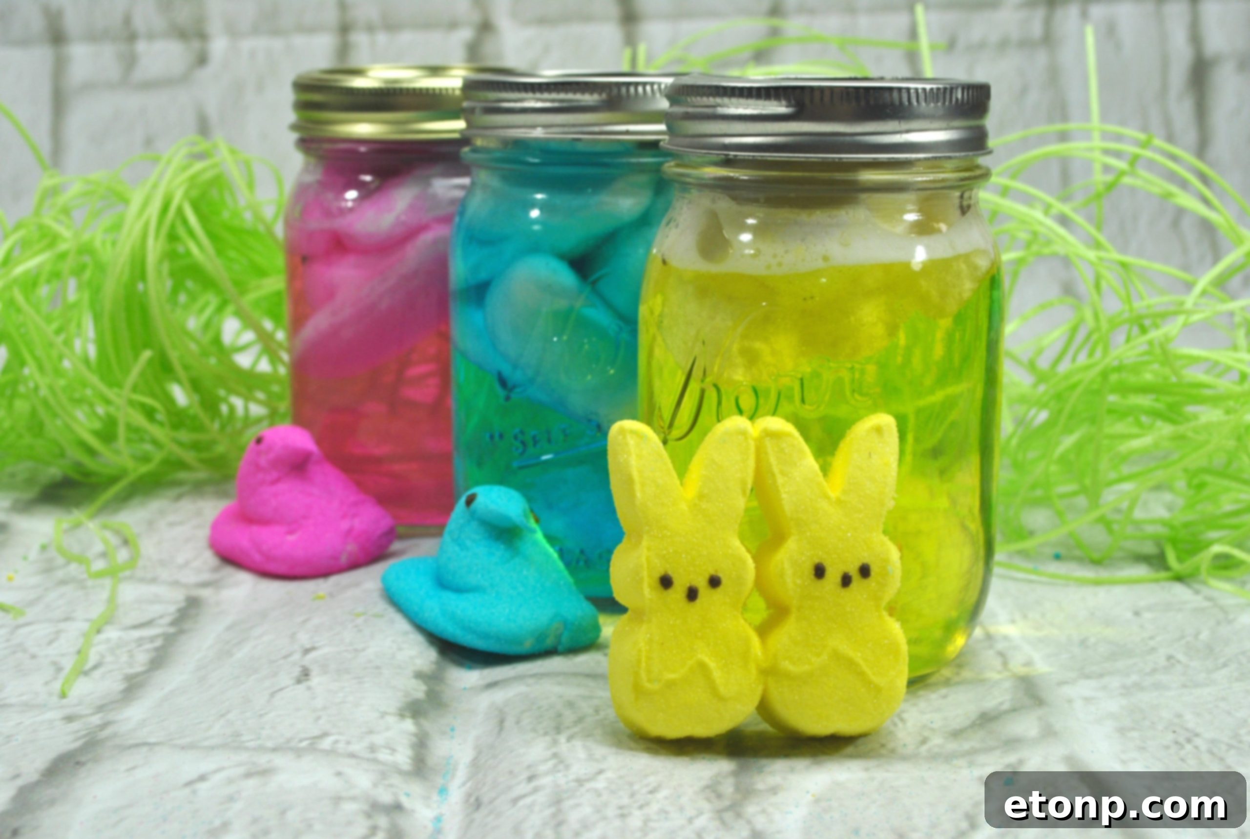 Close-up of vibrant pink Peeps vodka in a glass