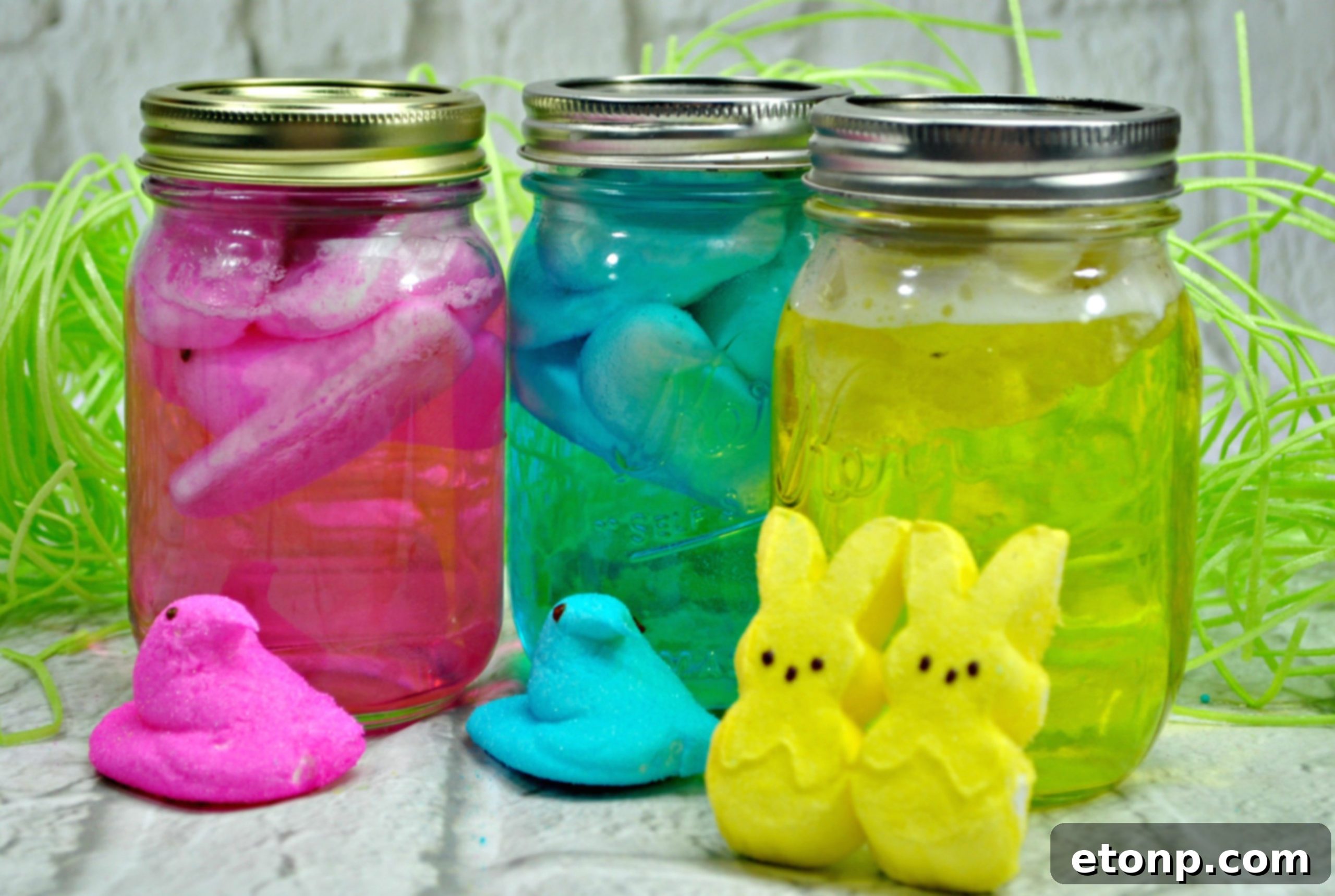 Various colors of Peeps vodka infusions in mason jars