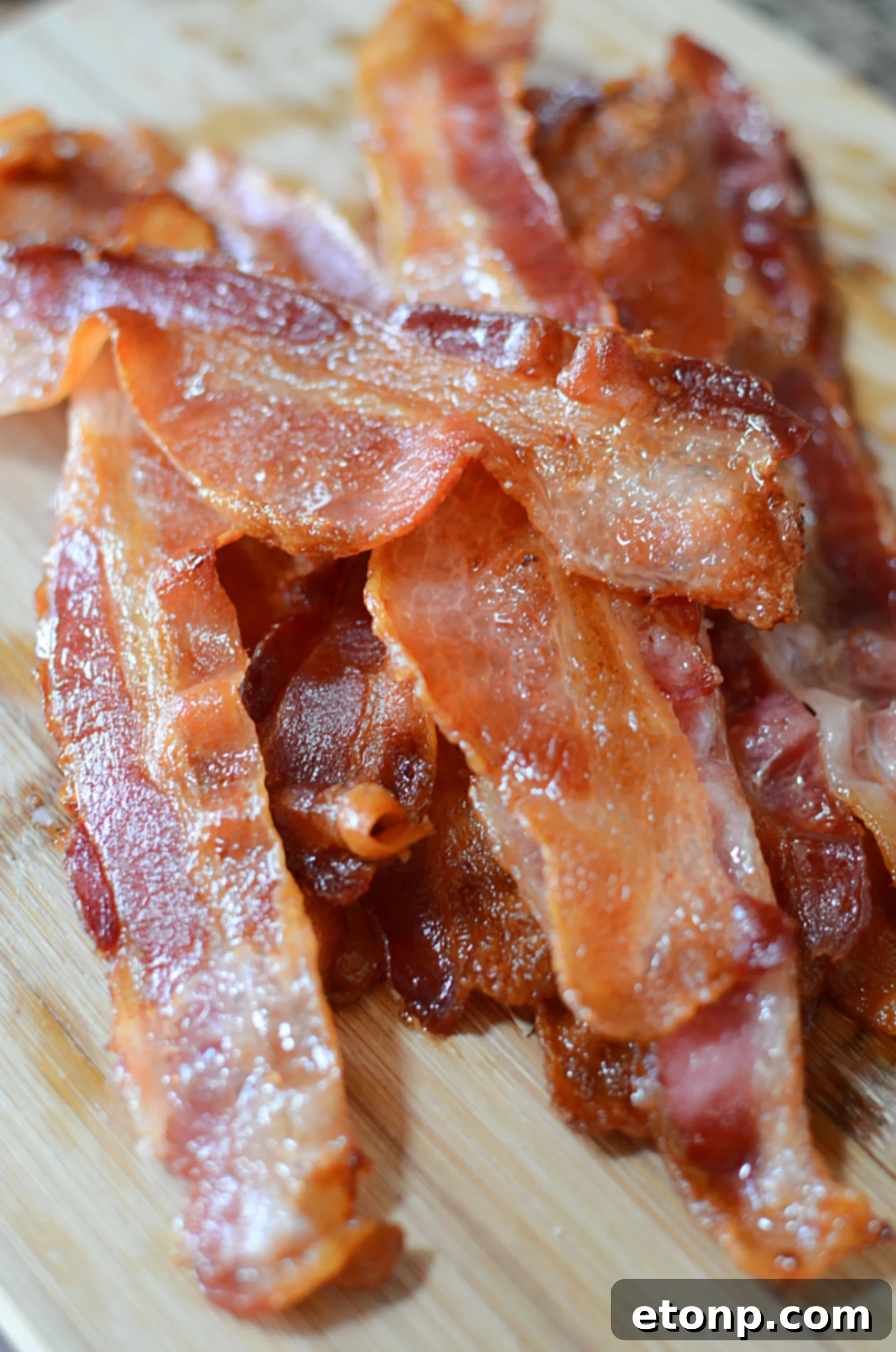 A tantalizing stack of perfectly cooked, golden and crispy bacon slices