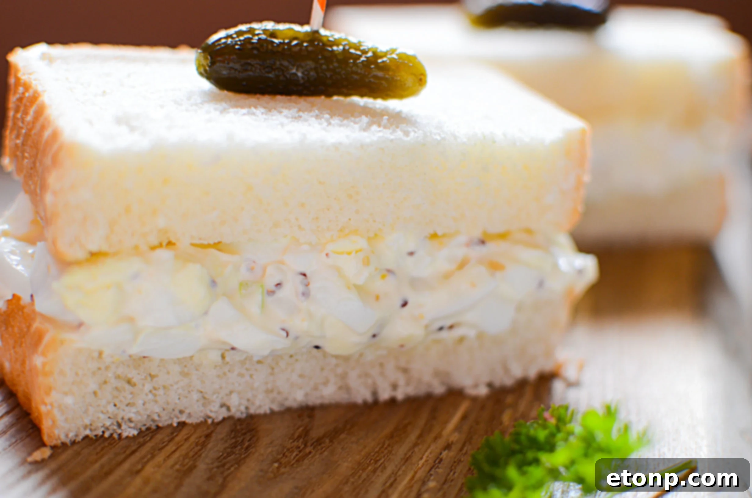 Creamy Egg Salad Perfection 2 Delicious creamy egg salad ready to be served on a plate