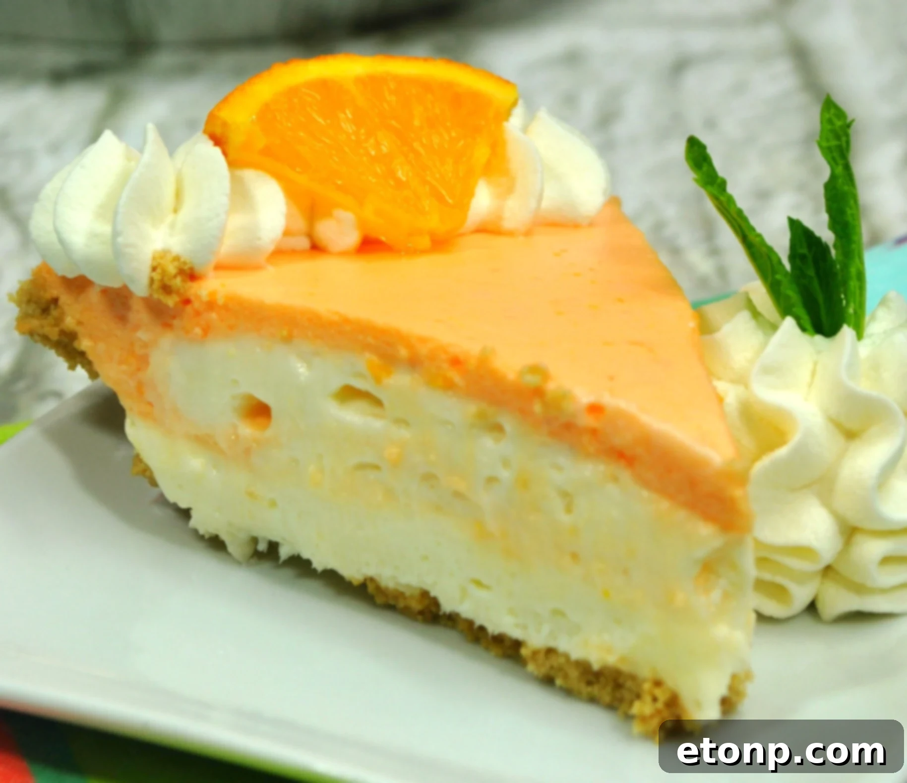 Dreamy No Bake Orange Creamsicle Cheesecake 2 Delicious slice of Orange Creamsicle Cheesecake