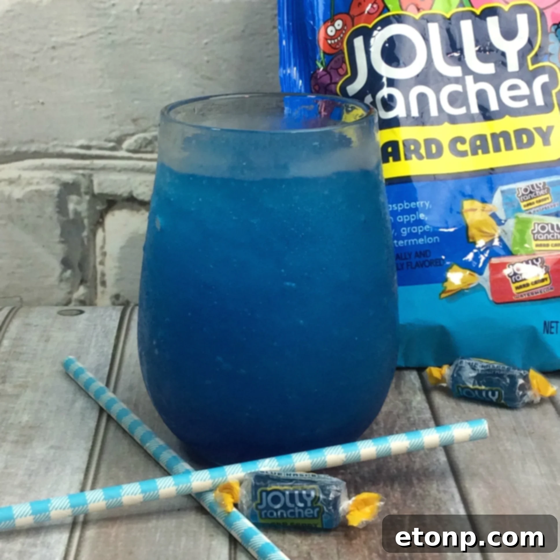 Two glasses of Blue Raspberry Jolly Rancher Slushy Cocktail, ready to be served.