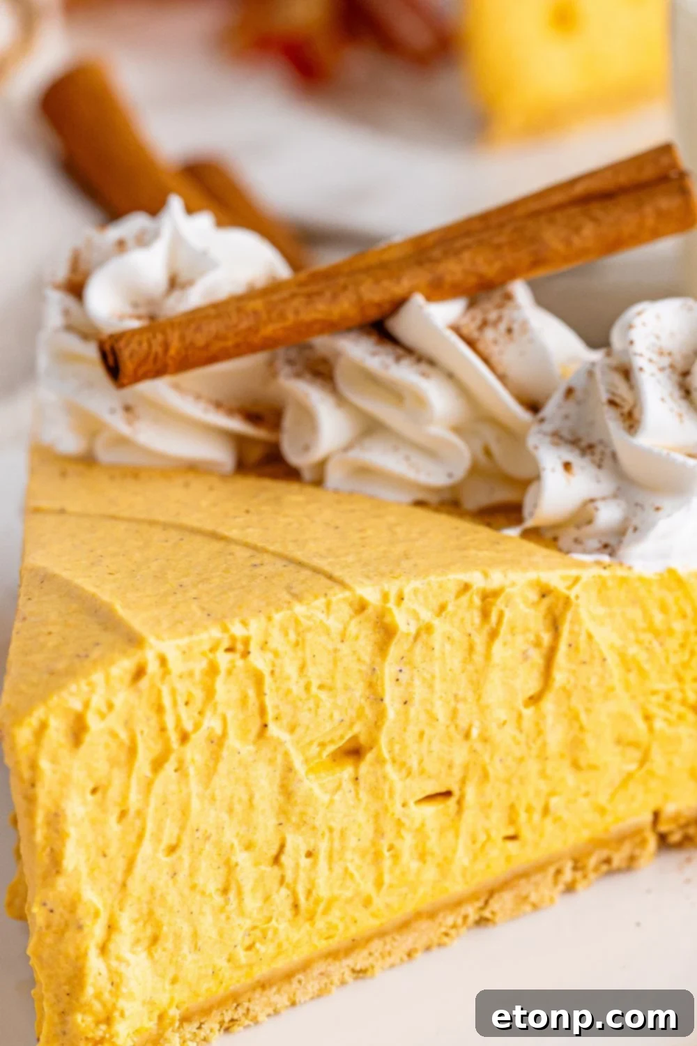 slice of pumpkin cheesecake on plate