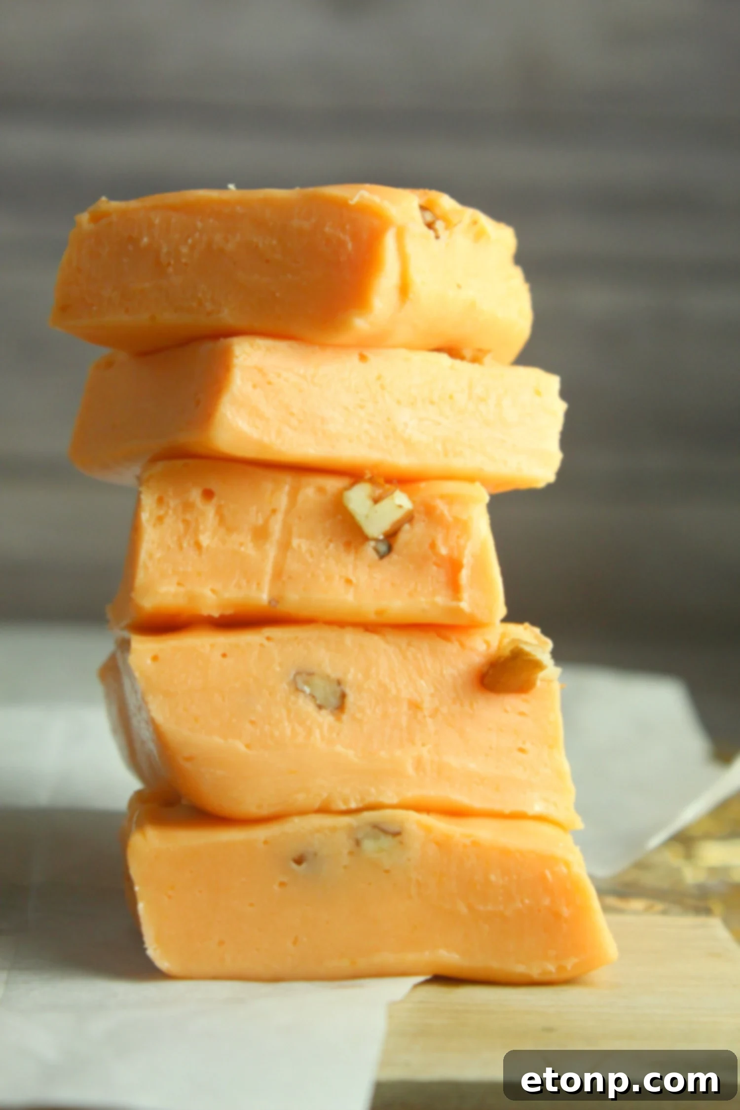 Close-up of creamy pumpkin fudge squares, ready to be served